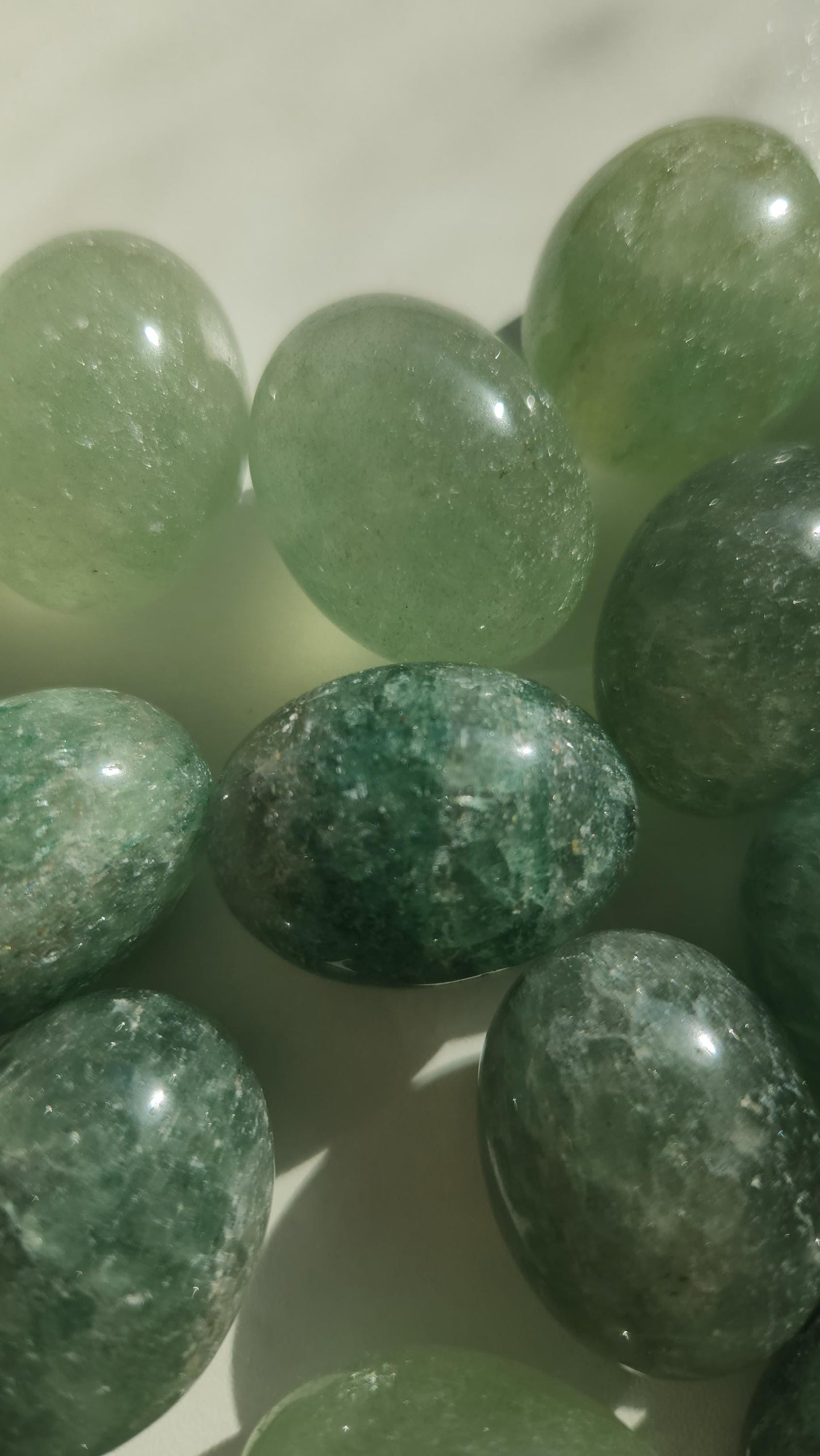 Sparkly green strawberry tumbles
