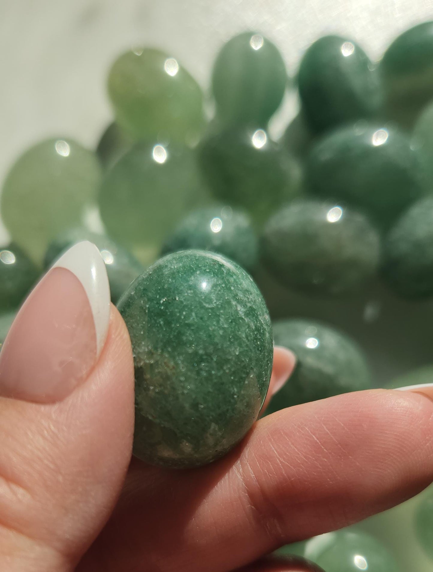 Sparkly green strawberry tumbles