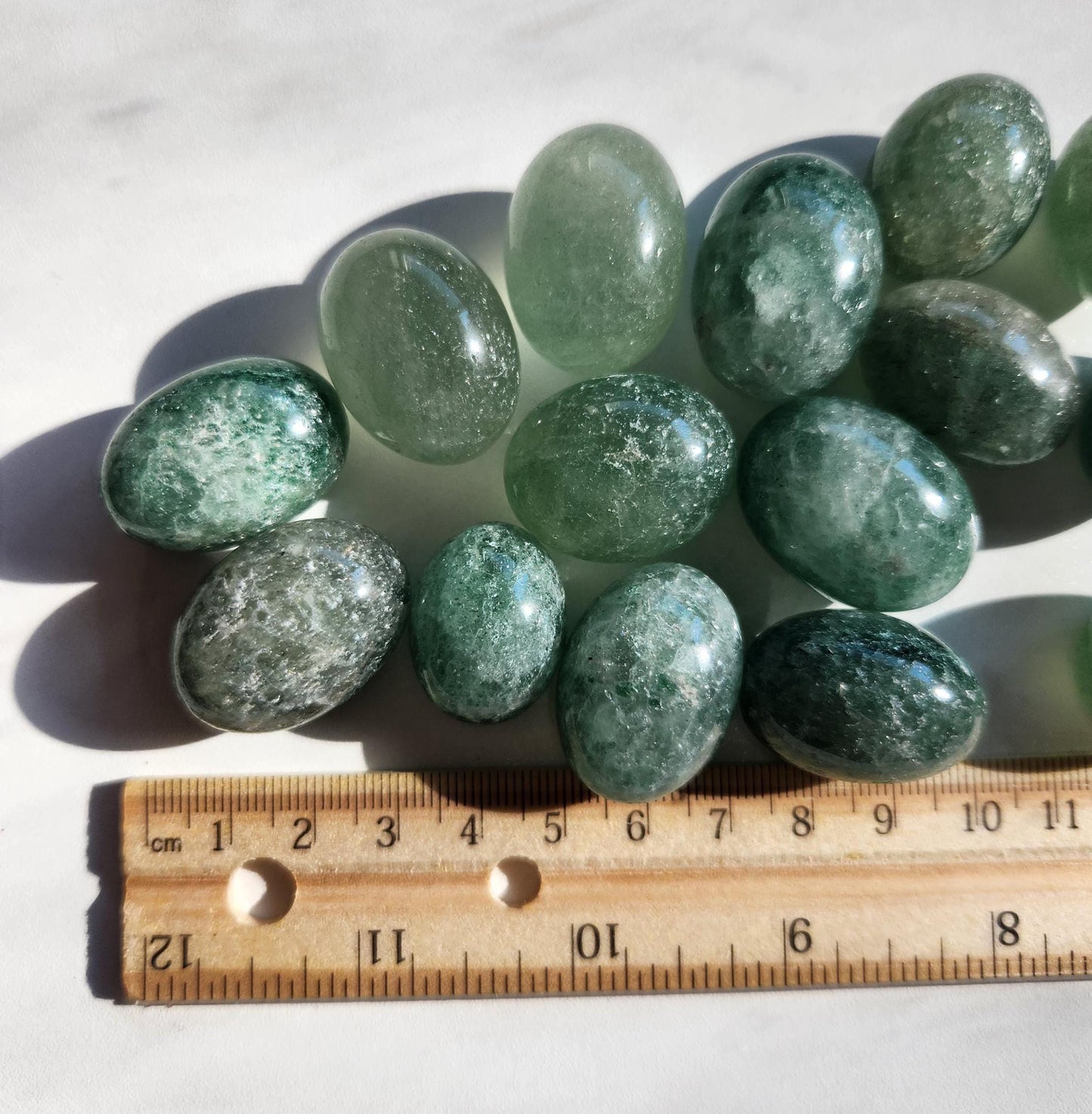 Sparkly green strawberry tumbles