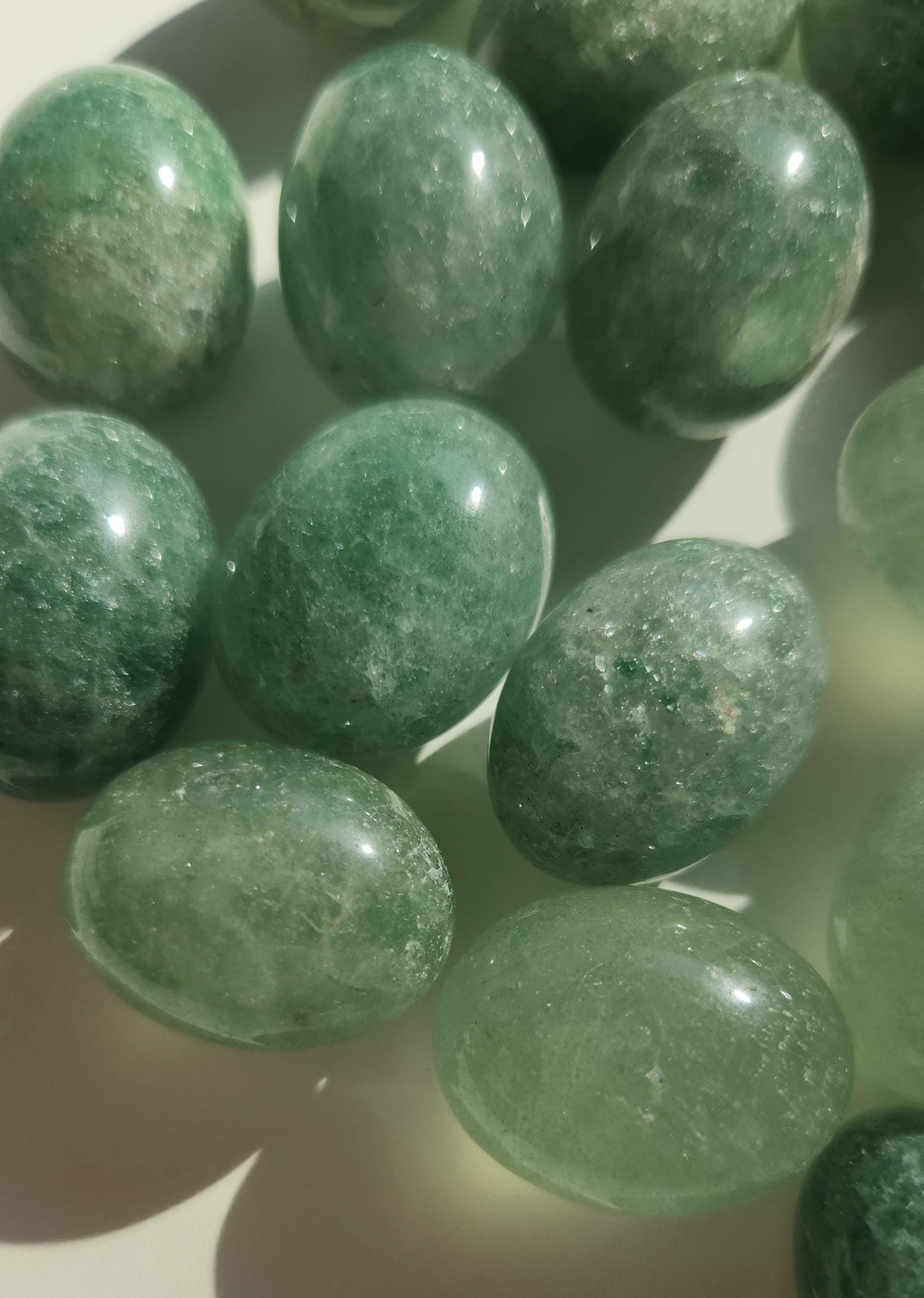 Sparkly green strawberry tumbles
