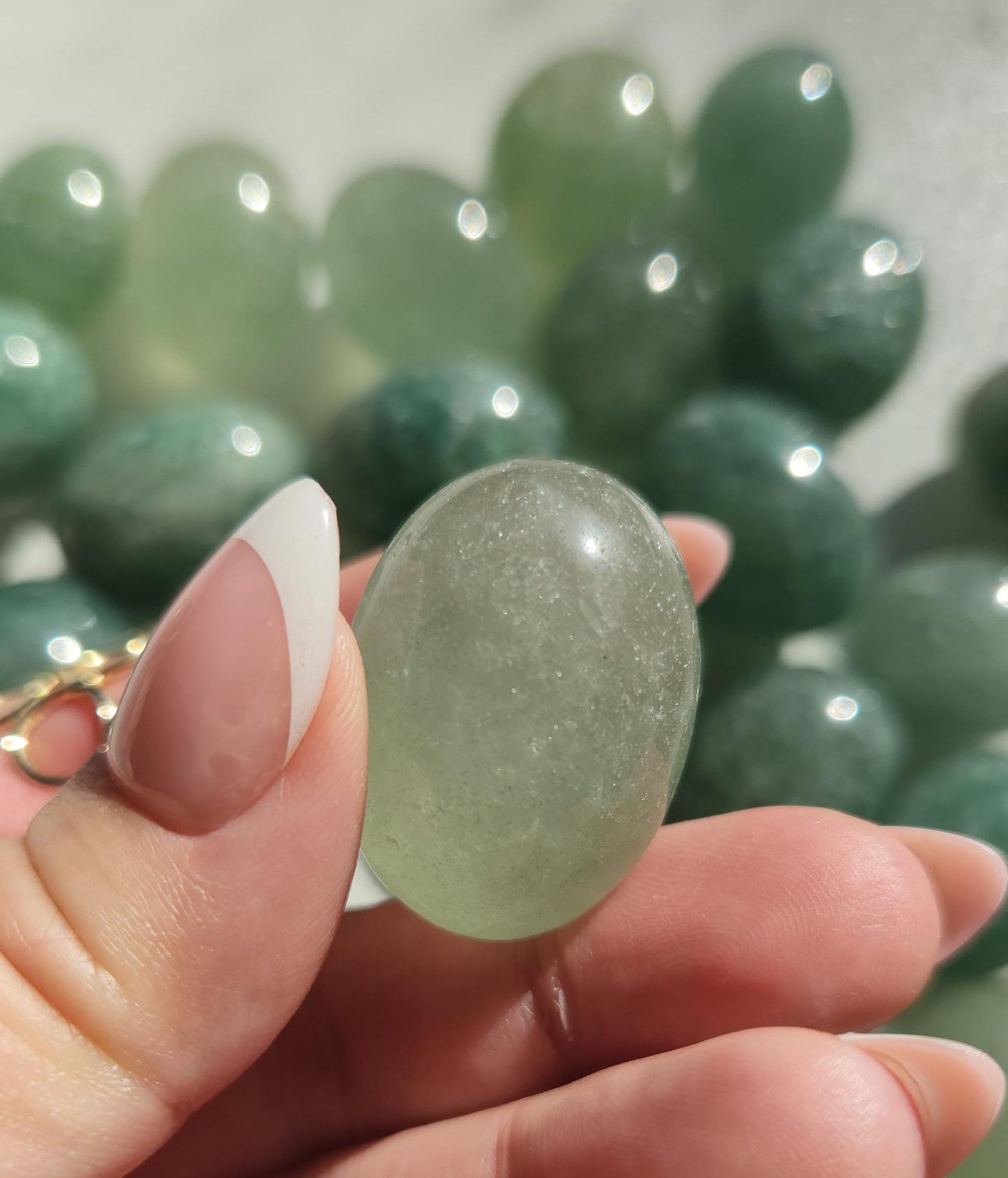 Sparkly green strawberry tumbles