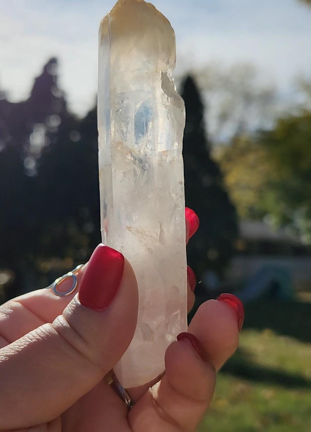 Rare large mango cigar quartz point with smoke from Columbia, self healed, collection piece