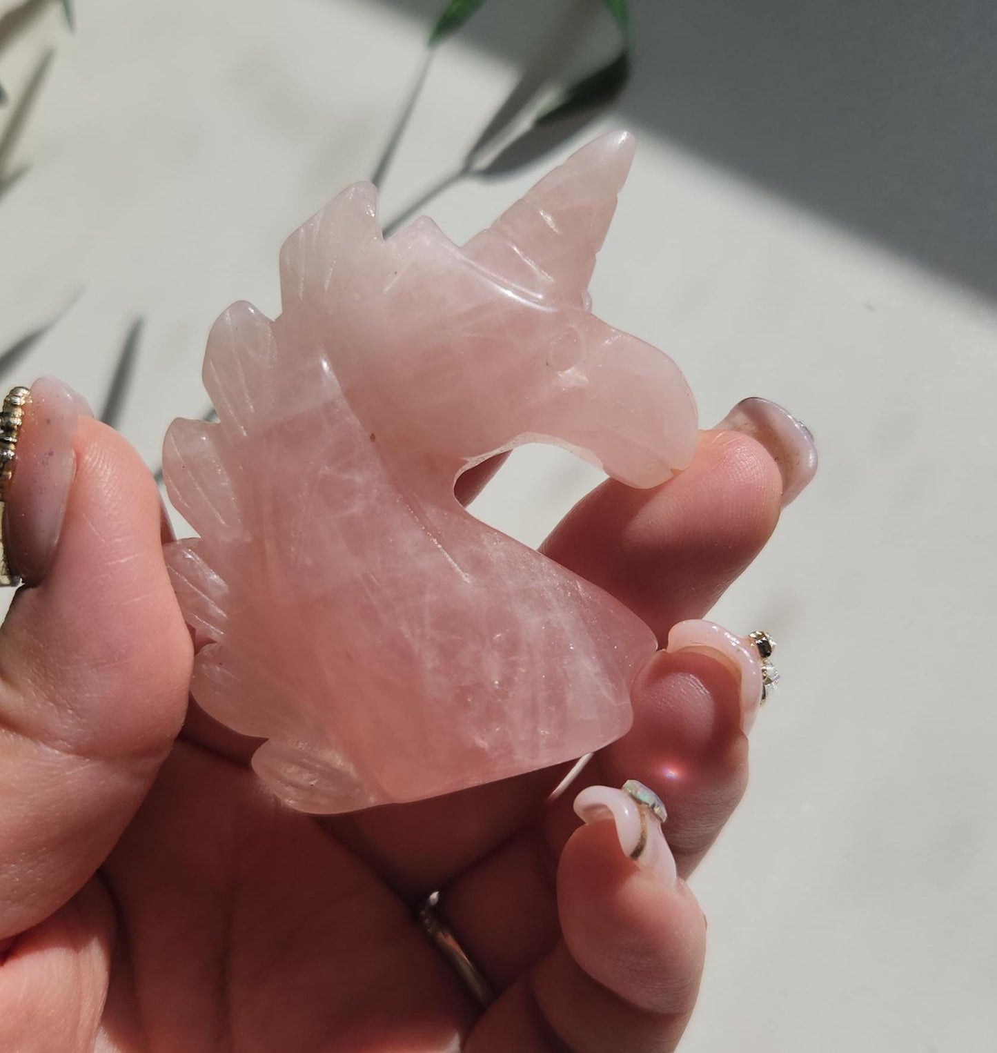 Pretty pink rose quartz unicorn carving