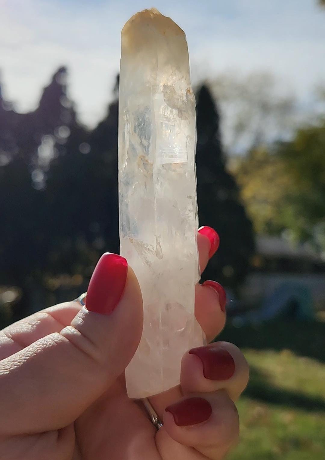 Rare large mango cigar quartz point with smoke from Columbia, self healed, collection piece