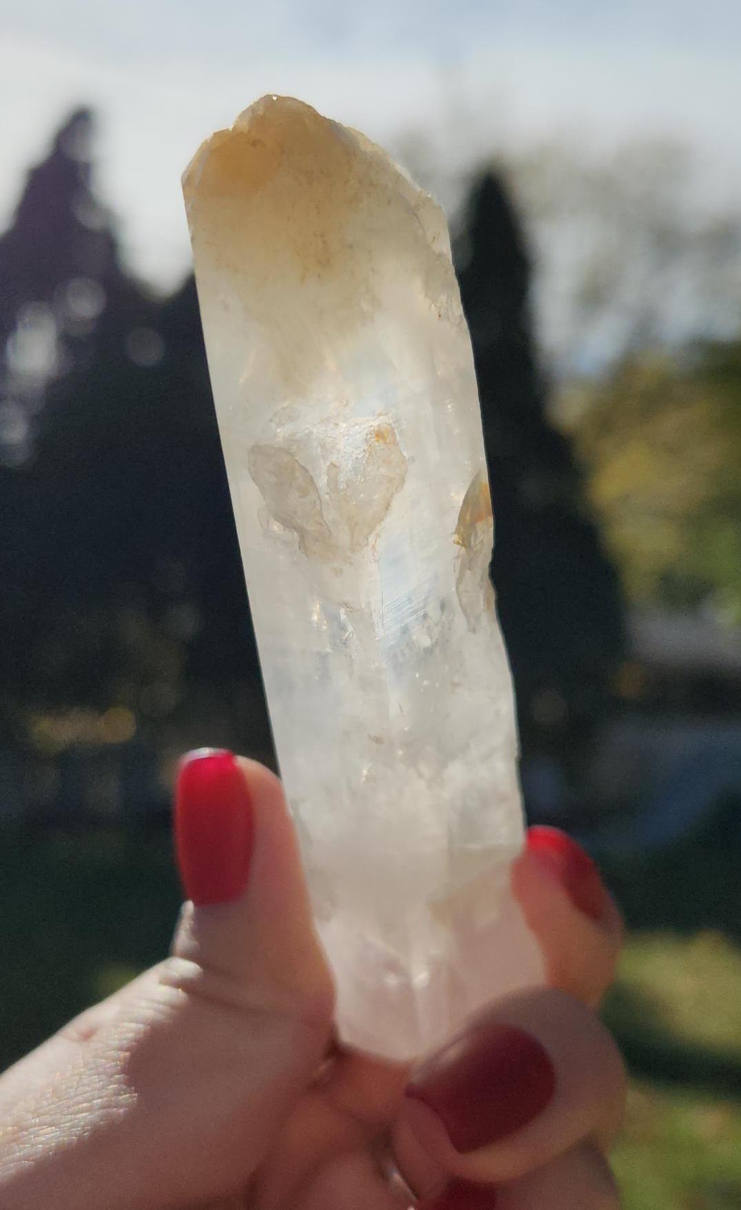 Rare large mango cigar quartz point with smoke from Columbia, self healed, collection piece