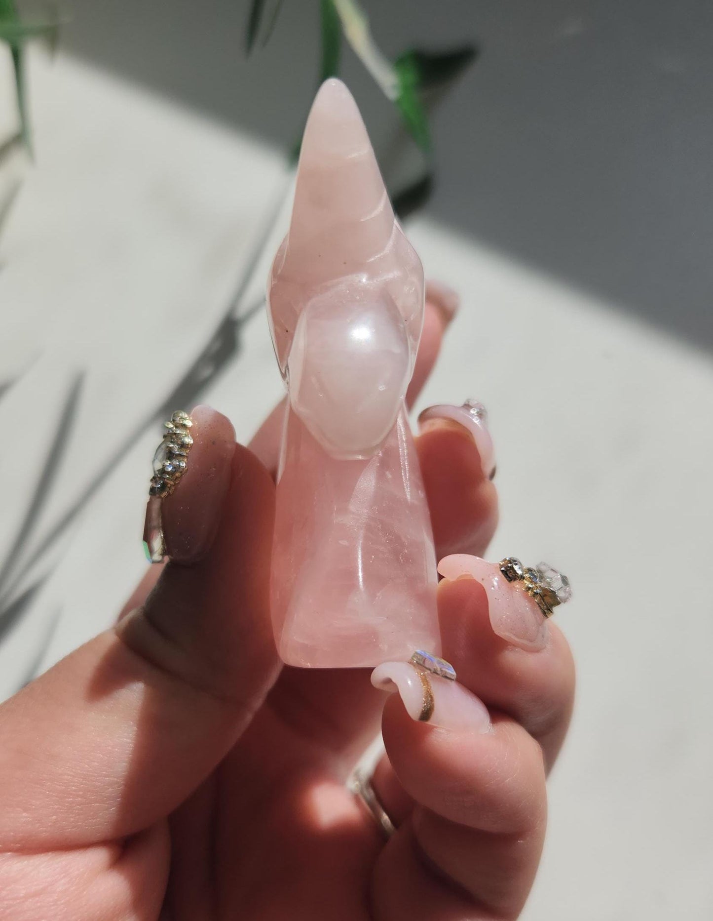 Pretty pink rose quartz unicorn carving
