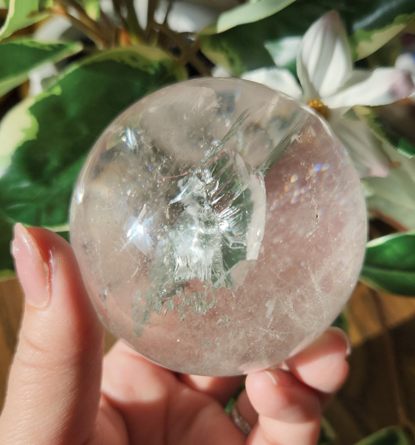 Amazing lemurian clear quartz sphere with rainbows and inclusions, from the Tocantins mine in Brazil, authentic lemurian 125L. 64-65mm