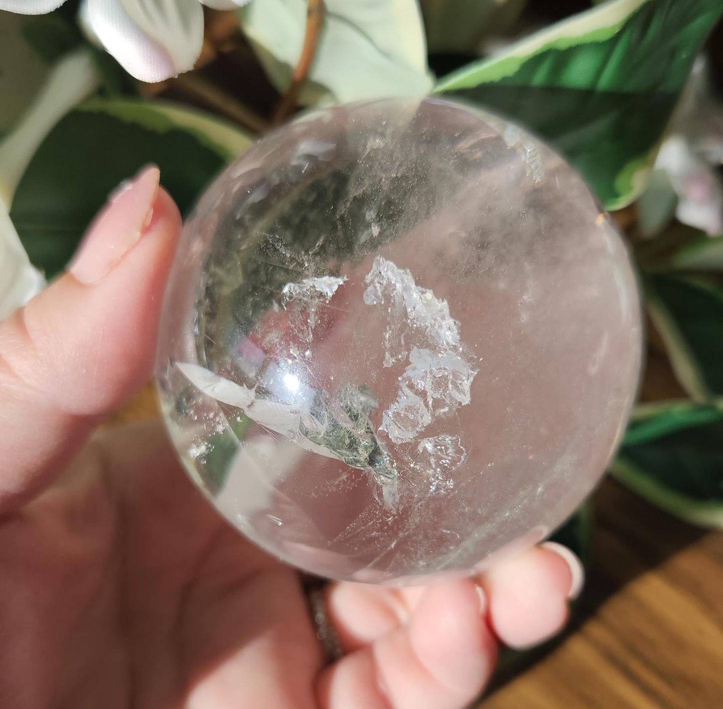 Amazing lemurian clear quartz sphere with rainbows and inclusions, from the Tocantins mine in Brazil, authentic lemurian 125L. 64-65mm