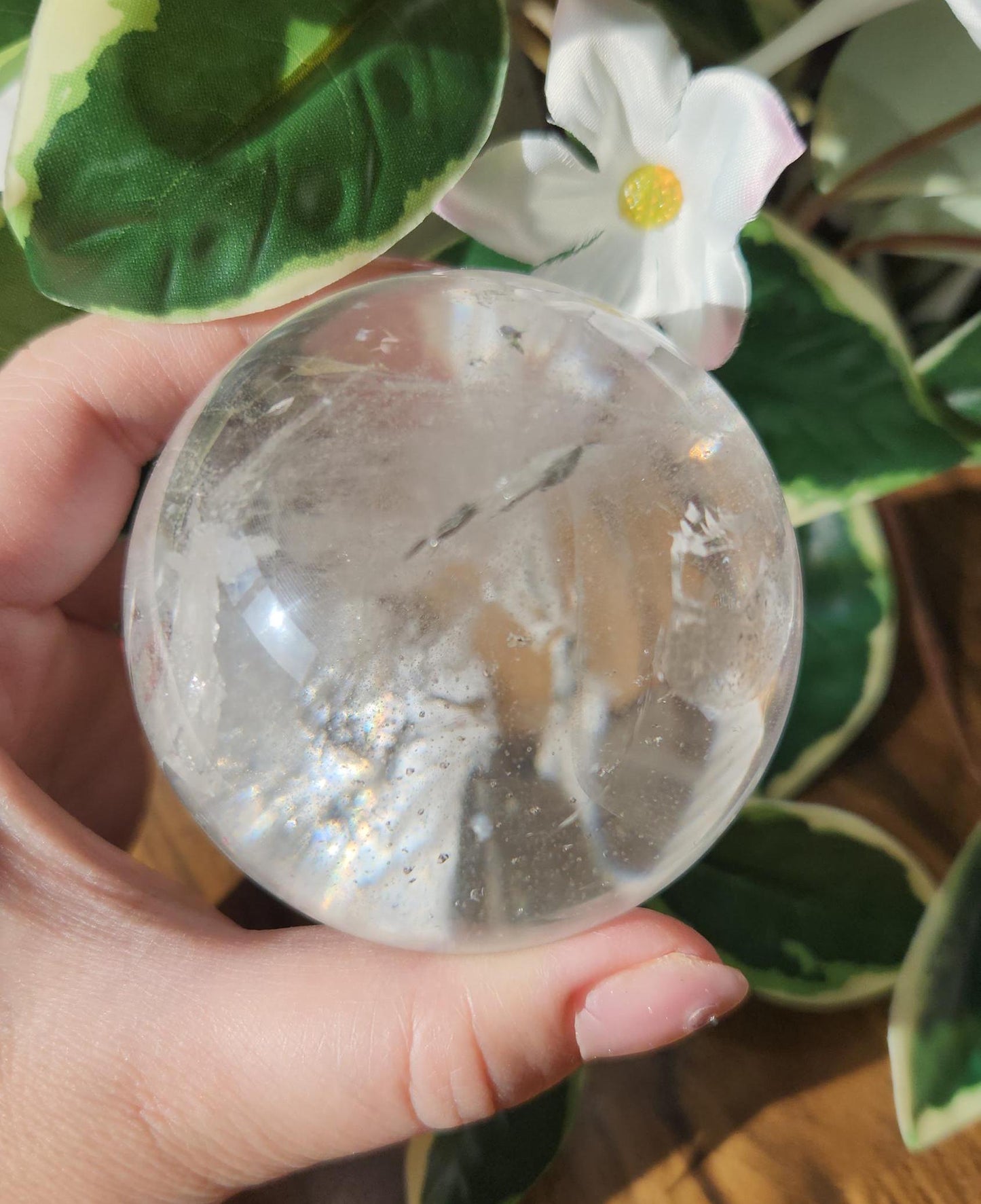 High quality lemurian clear quartz sphere with rainbows and inclusions, from the Tocantins mine in Brazil, authentic lemurian 146L 67.1mm