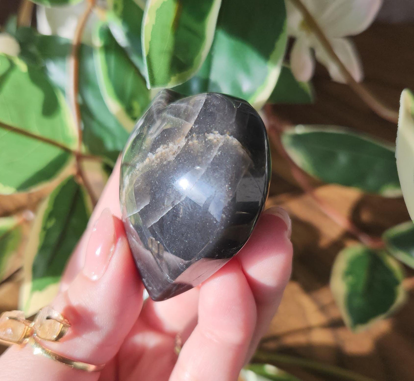 Beautiful black moonstone heart with a nice flash