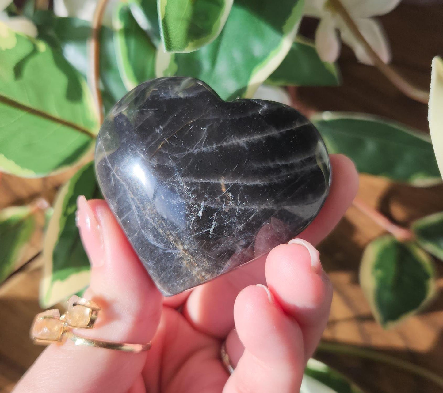 Beautiful black moonstone heart with a nice flash