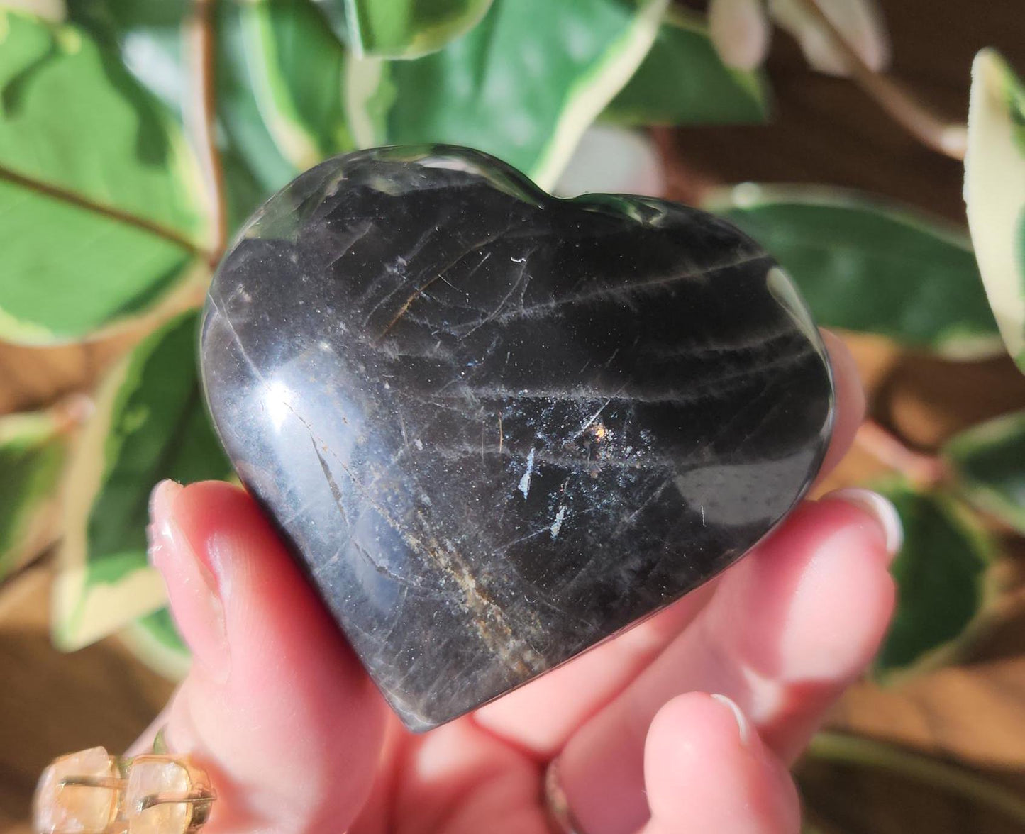 Beautiful black moonstone heart with a nice flash