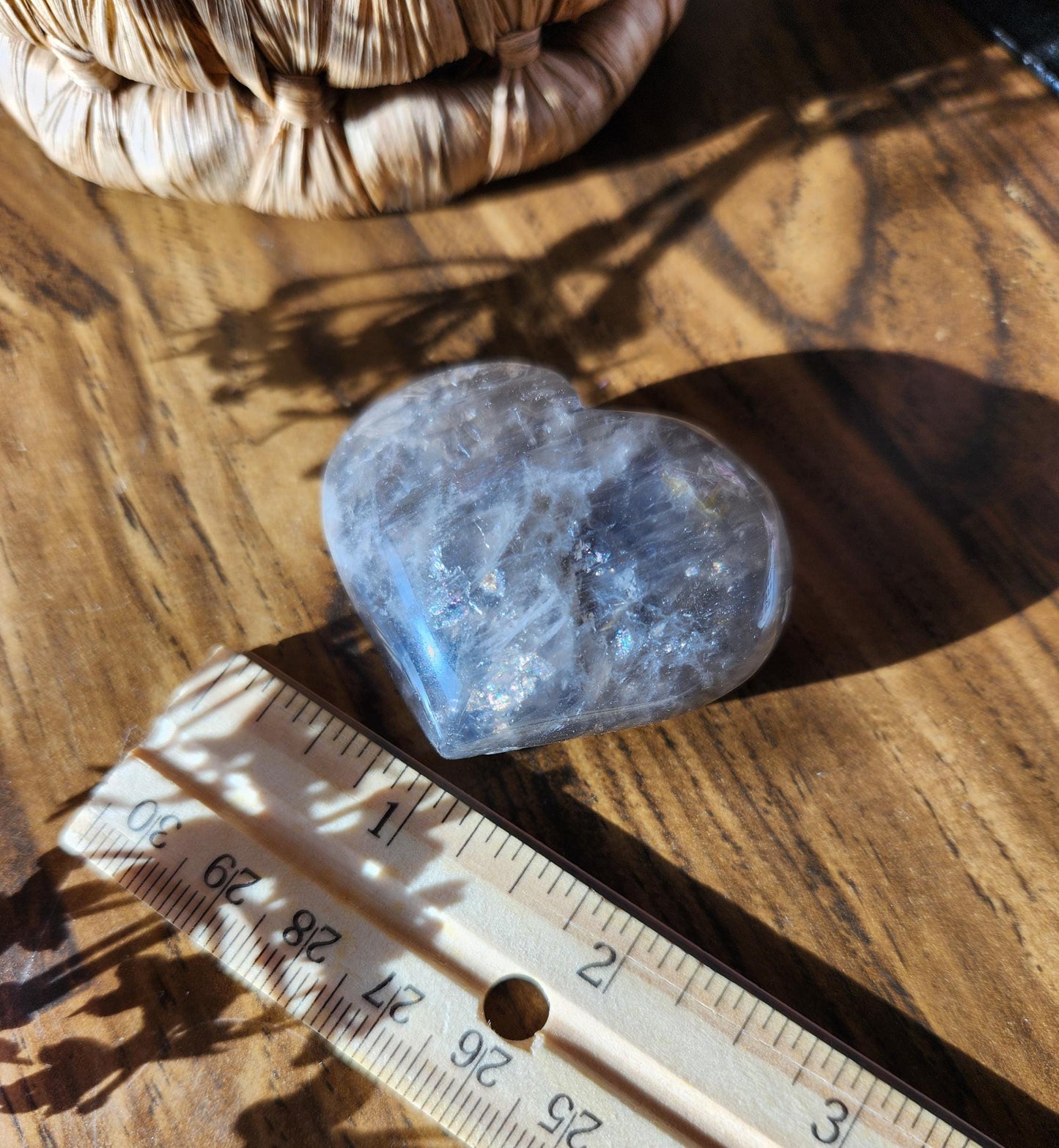 Pretty blue rose quartz heart with inclusions and rainbows