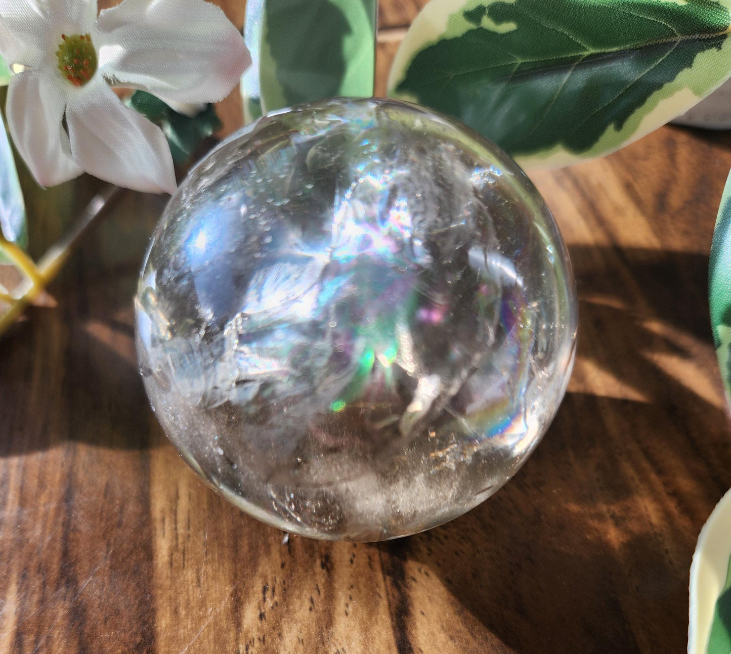Amazing natural light smoky quartz sphere with beautiful rainbows and inclusions