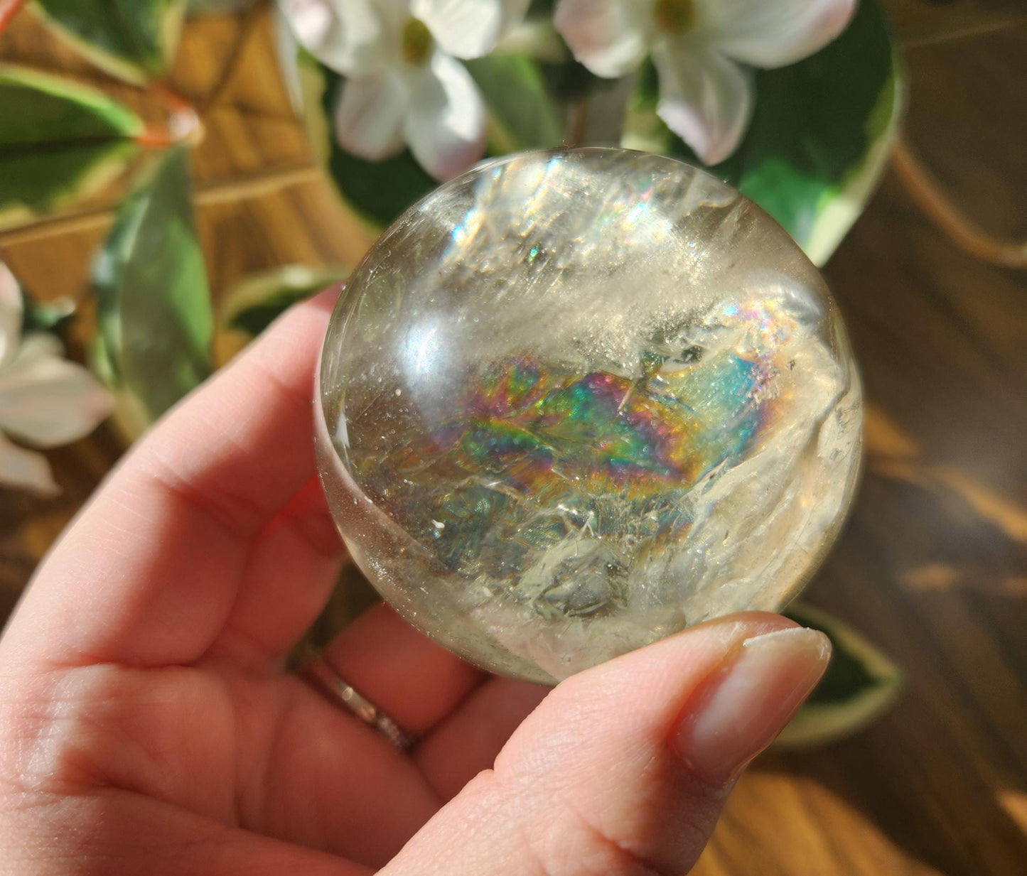 Amazing natural light smoky quartz sphere with beautiful rainbows and inclusions