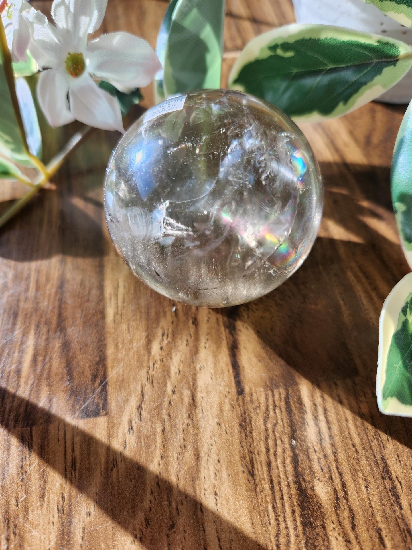Amazing natural light smoky quartz sphere with beautiful rainbows and inclusions
