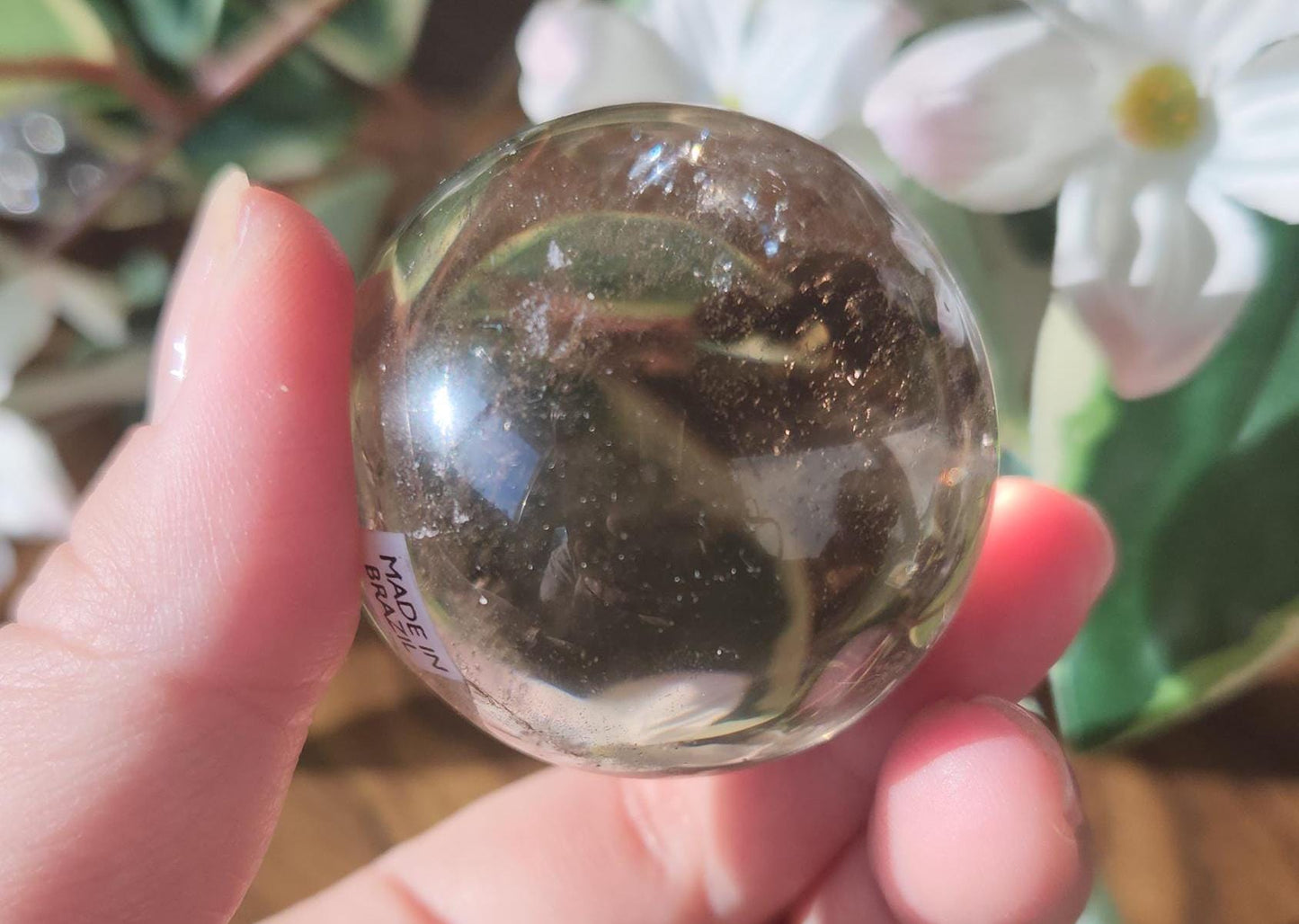 High quality natural smoky quartz sphere with many rainbows and inclusions 34A