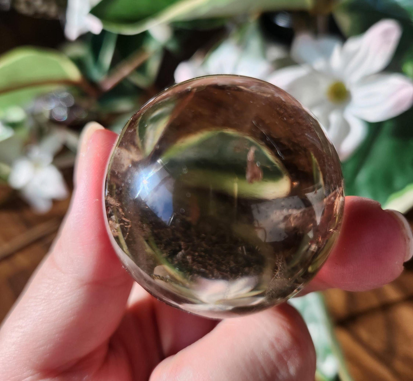 High quality natural smoky quartz sphere with many rainbows and inclusions 34A