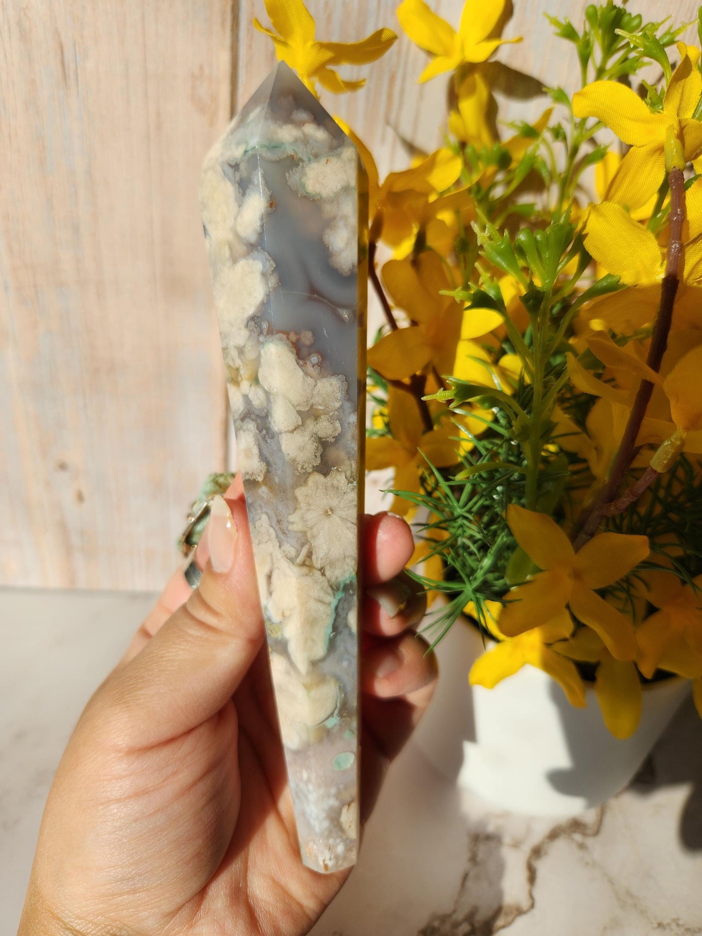 Natural black flower agate wand with stand, has quartz, black chalcedony, a touch of green, and beautiful agate banding from Madagascar