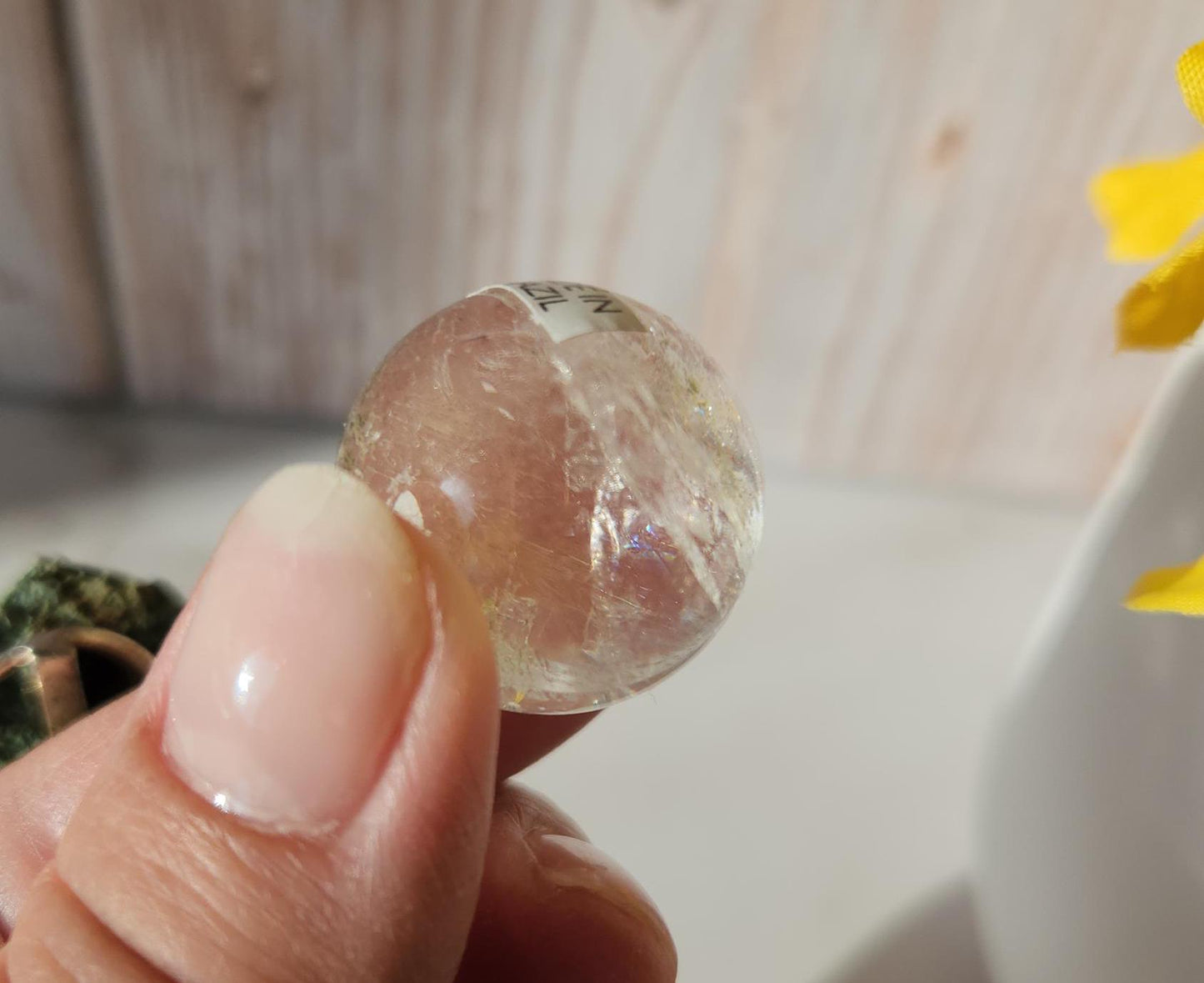 Rainbow clear quartz sphere with inclusions, from Brazil 22.5mm