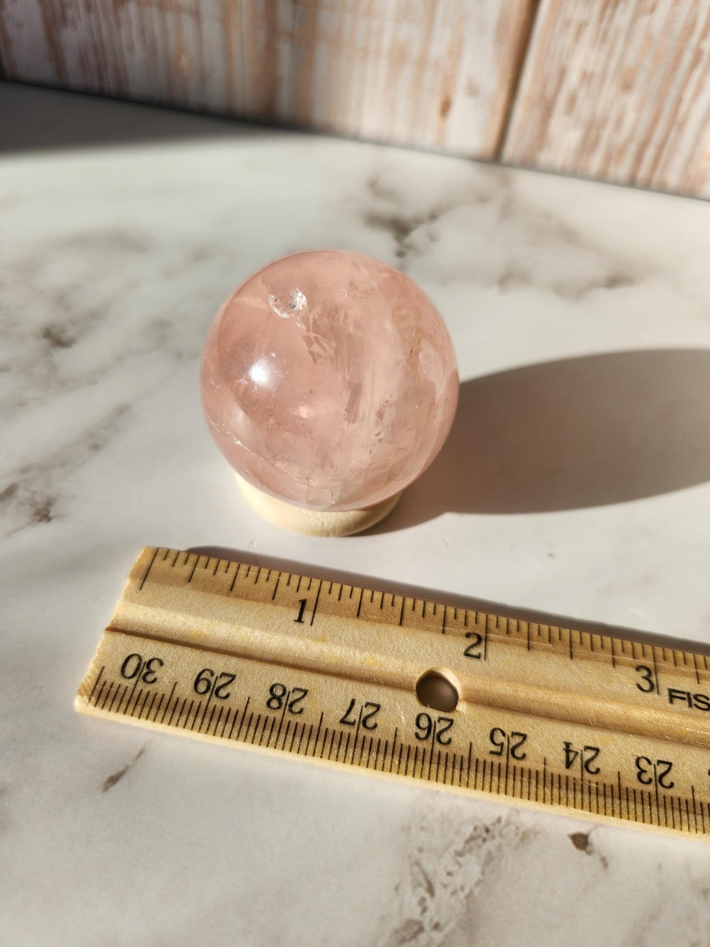 Star rose quartz sphere