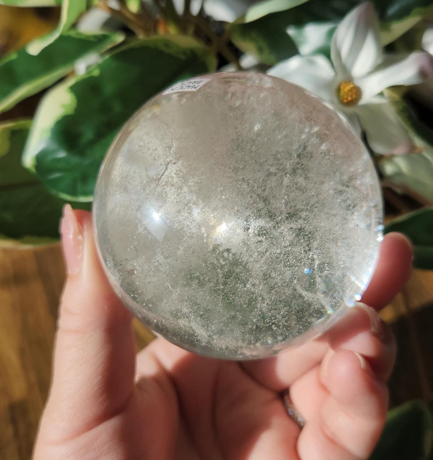 Amazing lemurian clear quartz sphere with rainbows and inclusions, from the Tocantins mine in Brazil, authentic lemurian 125L. 64-65mm