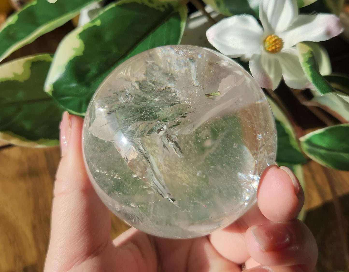 Amazing lemurian clear quartz sphere with rainbows and inclusions, from the Tocantins mine in Brazil, authentic lemurian 125L. 64-65mm