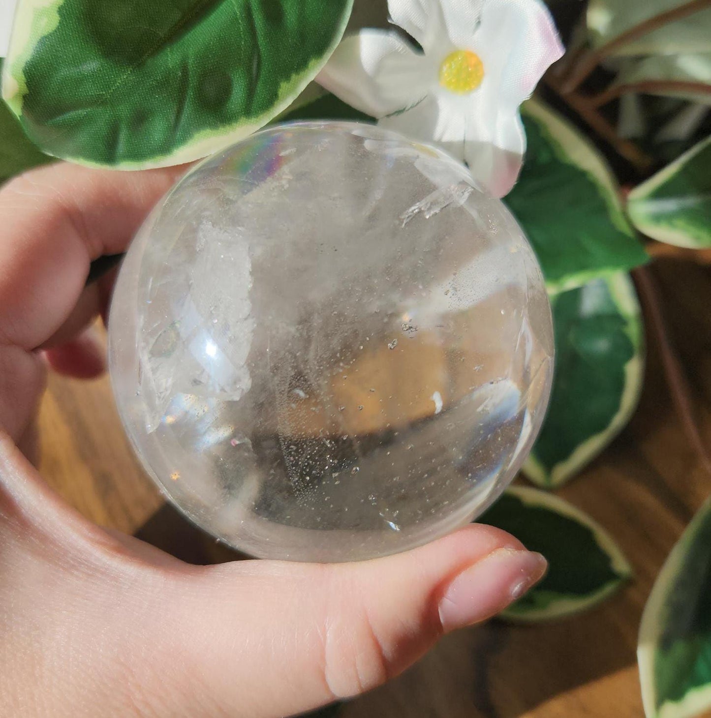 High quality lemurian clear quartz sphere with rainbows and inclusions, from the Tocantins mine in Brazil, authentic lemurian 146L 67.1mm