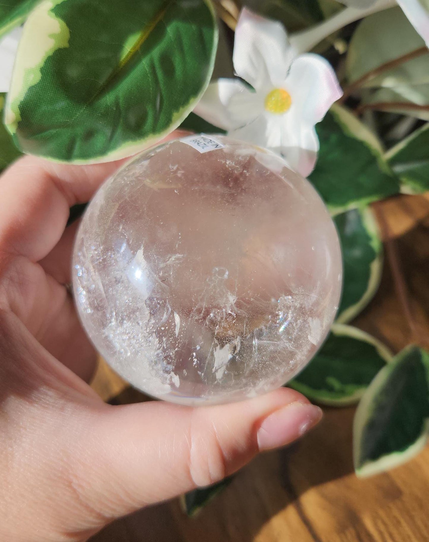 High quality lemurian clear quartz sphere with rainbows and inclusions, from the Tocantins mine in Brazil, authentic lemurian 146L 67.1mm