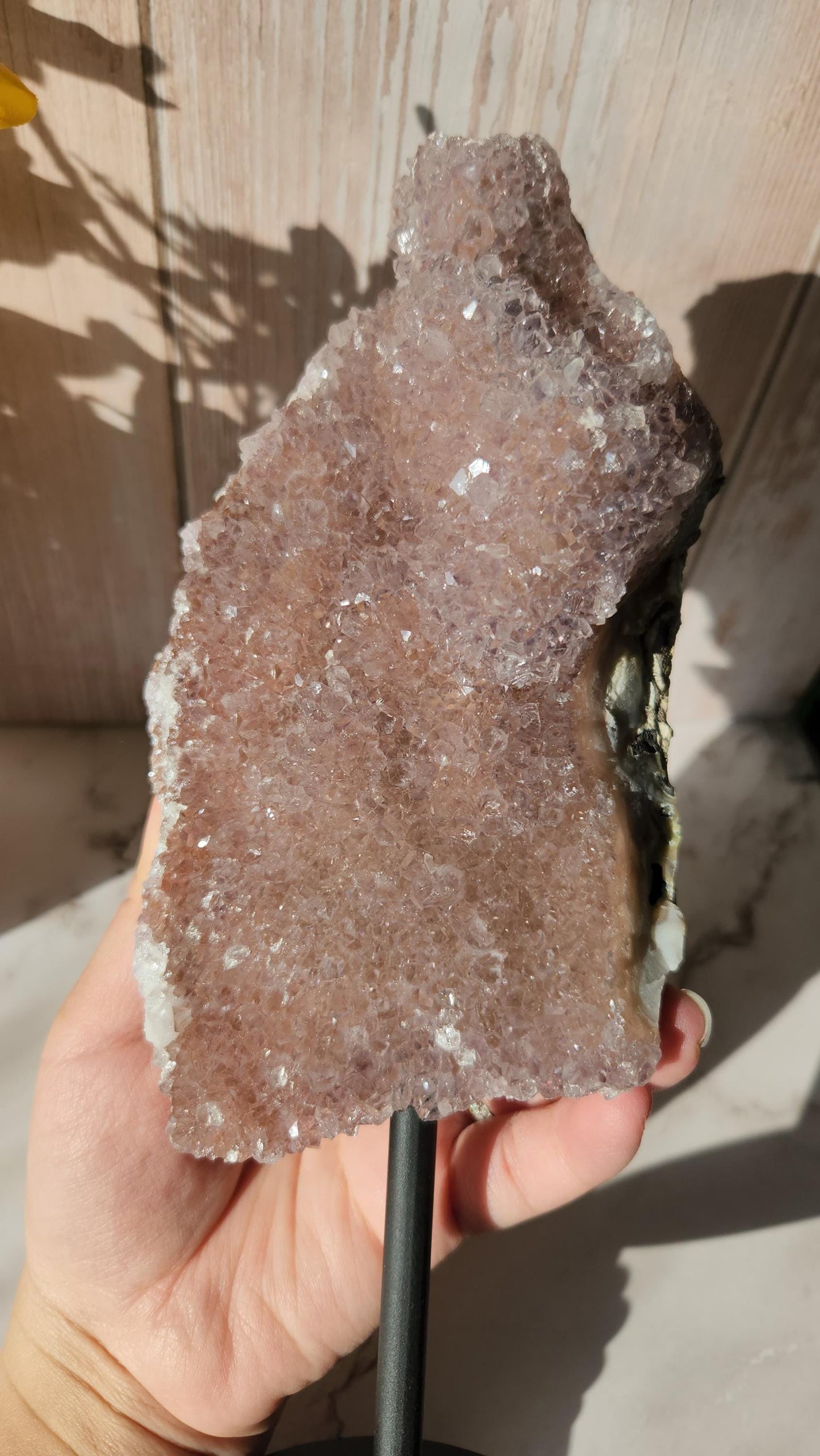 Large dusty pink rainbow amethyst on stand, natural unpolished rainbow amethyst with lustrous and sparkly points