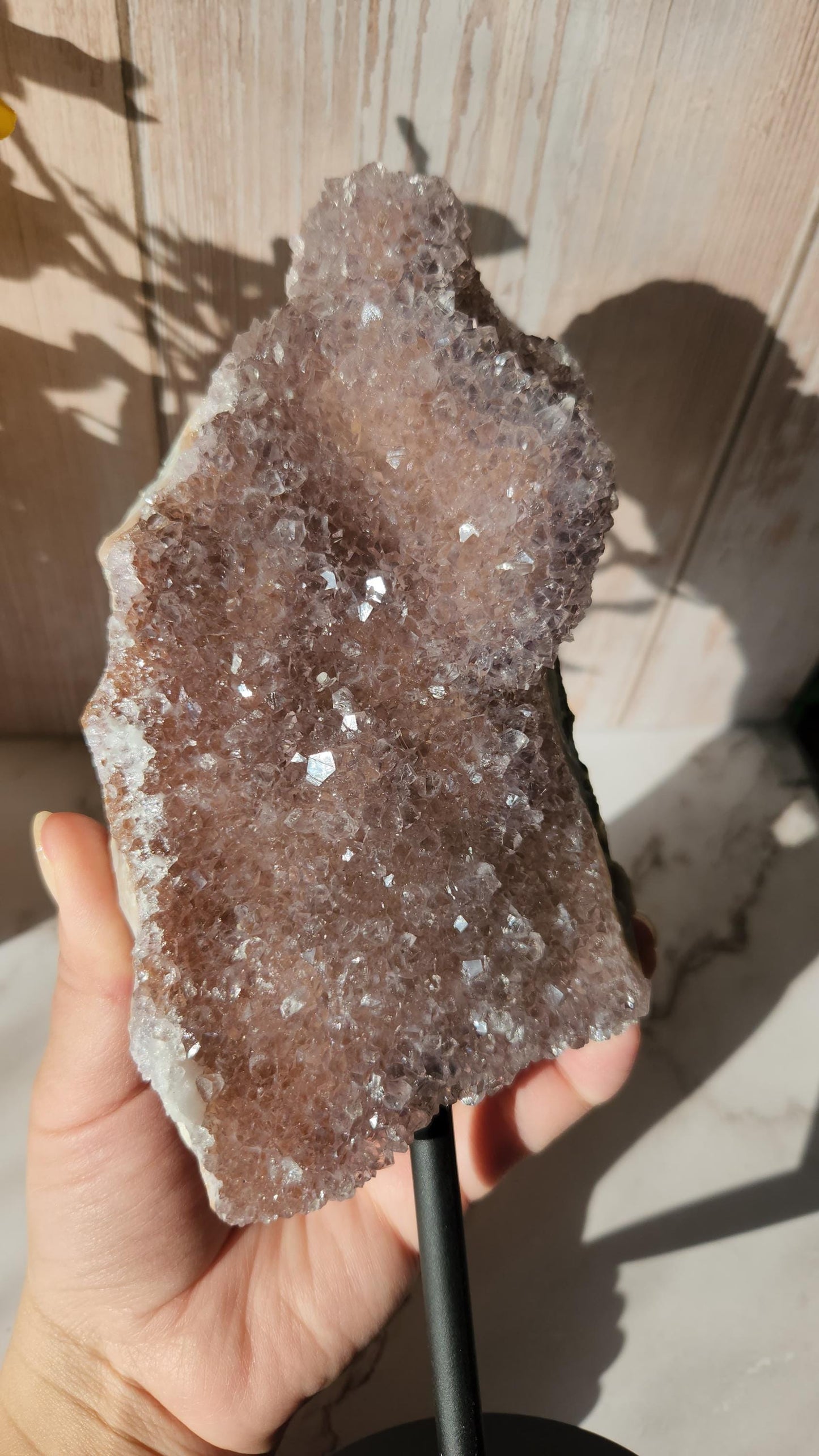 Large dusty pink rainbow amethyst on stand, natural unpolished rainbow amethyst with lustrous and sparkly points