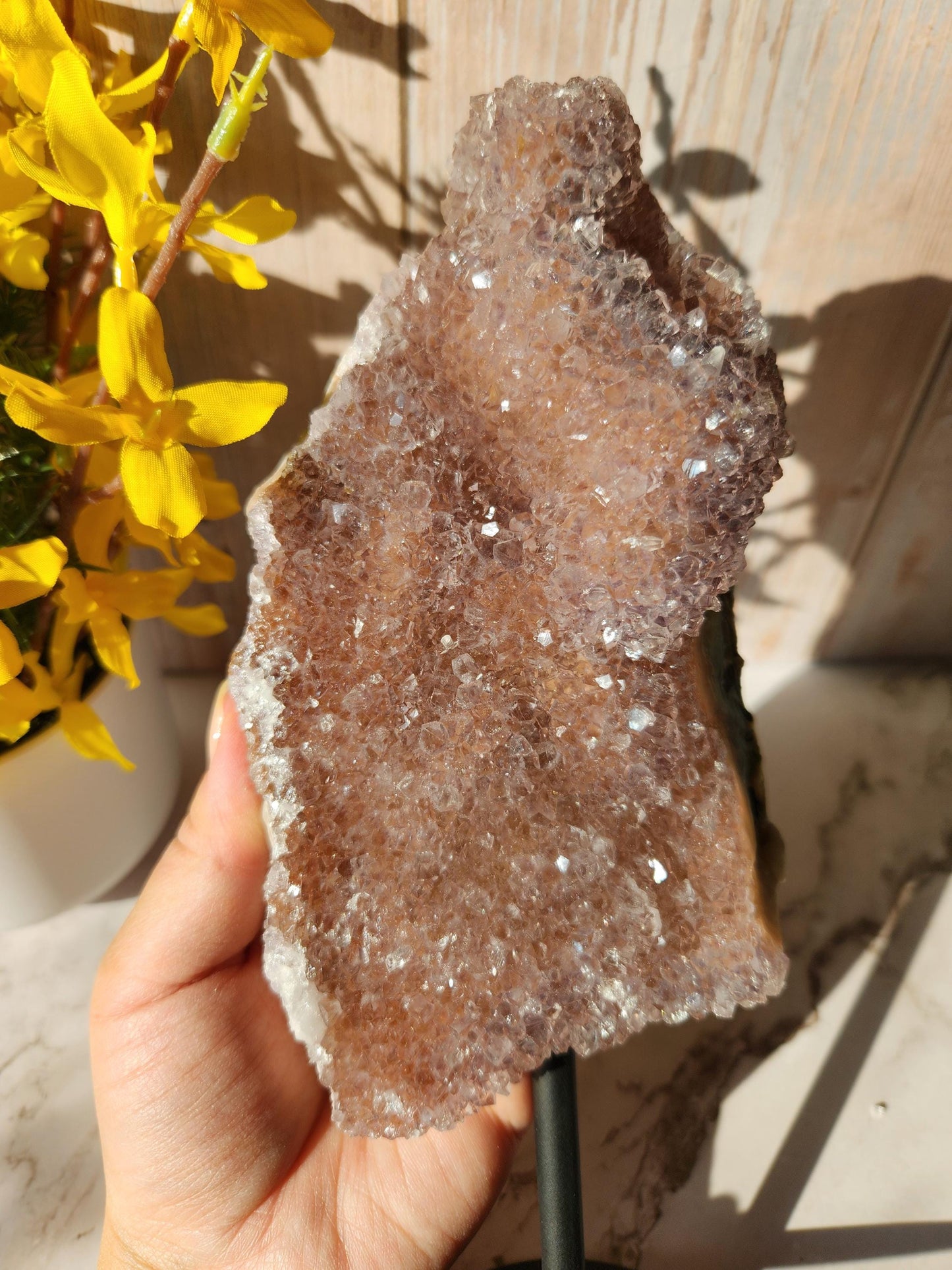 Large dusty pink rainbow amethyst on stand, natural unpolished rainbow amethyst with lustrous and sparkly points
