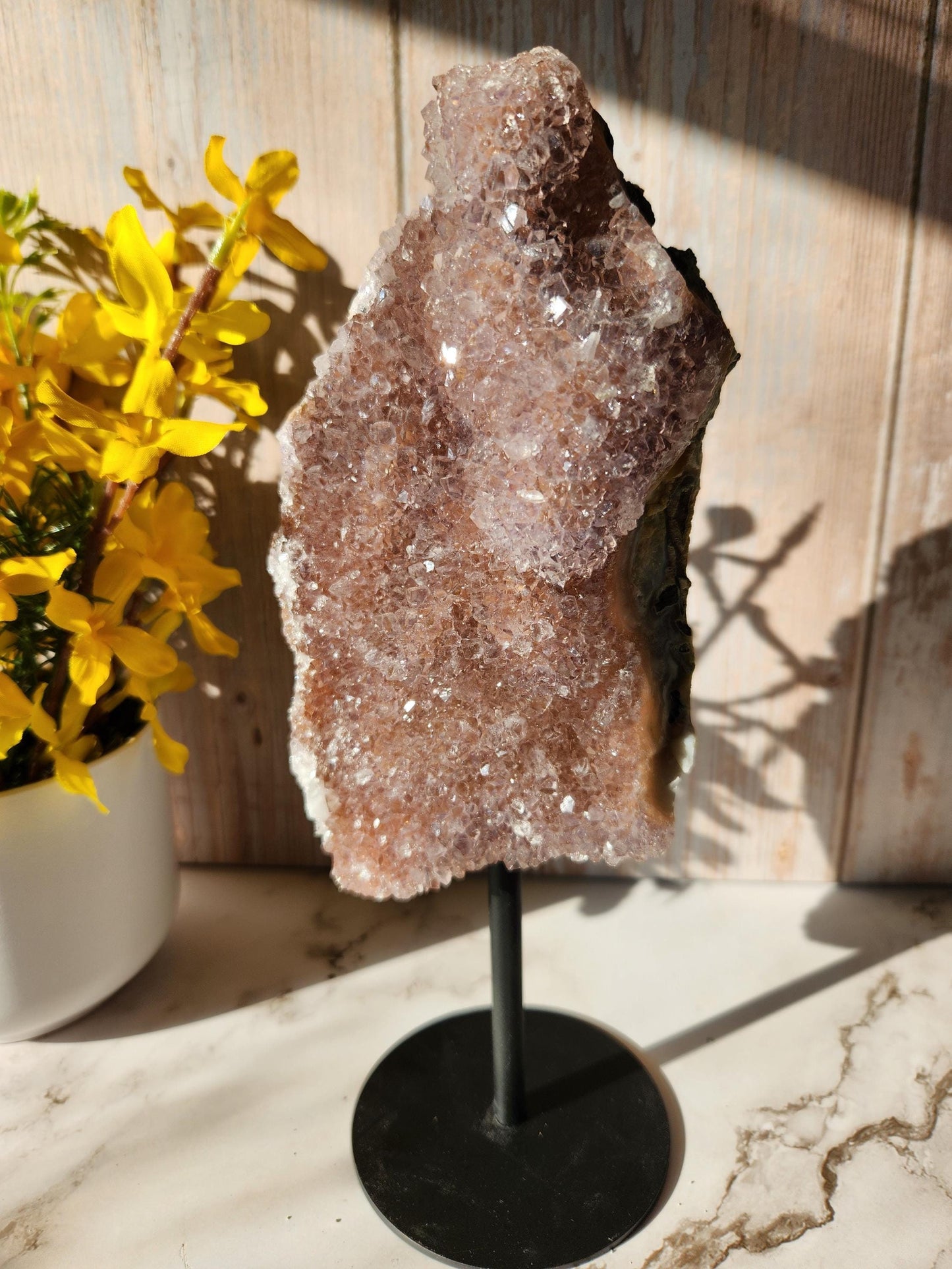 Large dusty pink rainbow amethyst on stand, natural unpolished rainbow amethyst with lustrous and sparkly points