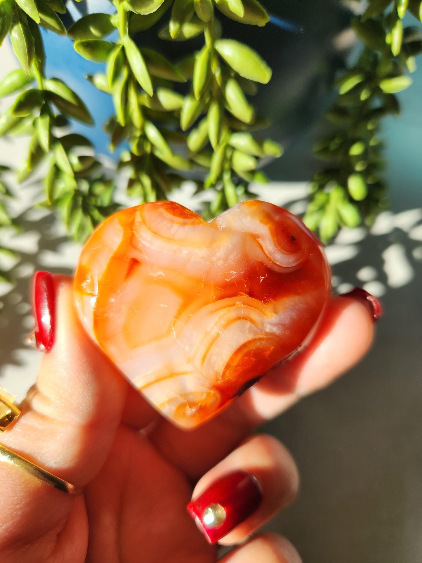 Beautiful carnelian heart carving from Madagascar with pretty patterns, natural