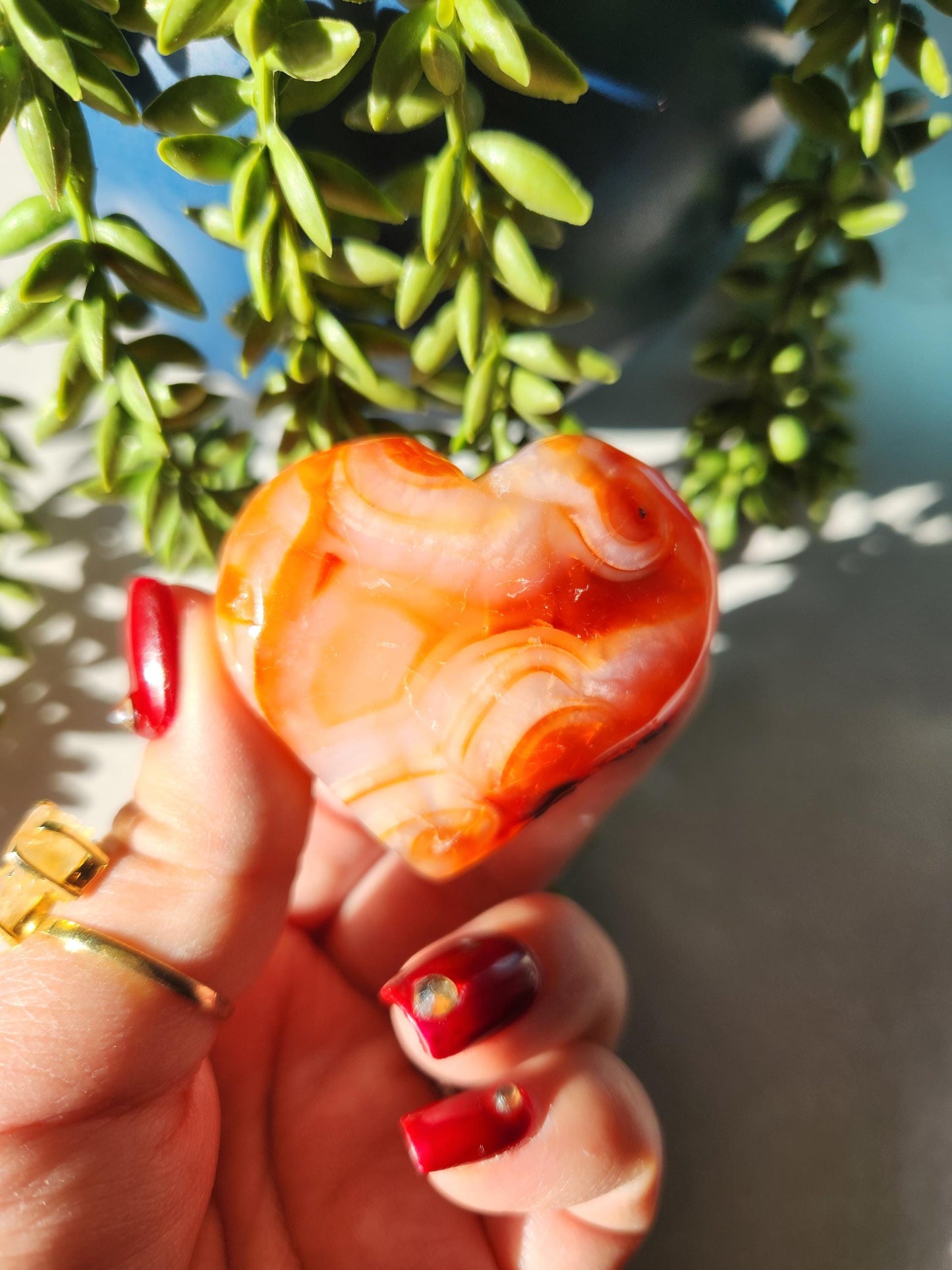 Beautiful carnelian heart carving from Madagascar with pretty patterns, natural