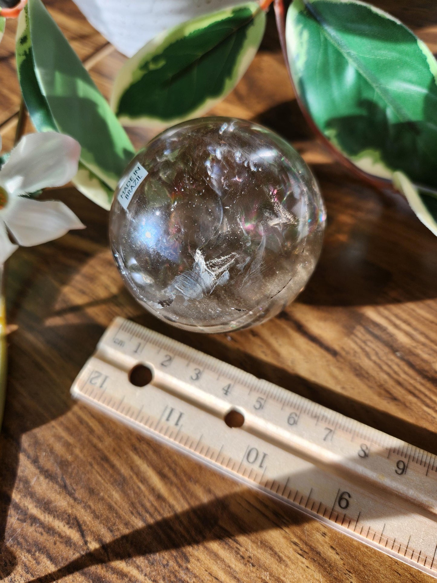Amazing natural light smoky quartz sphere with beautiful rainbows and inclusions