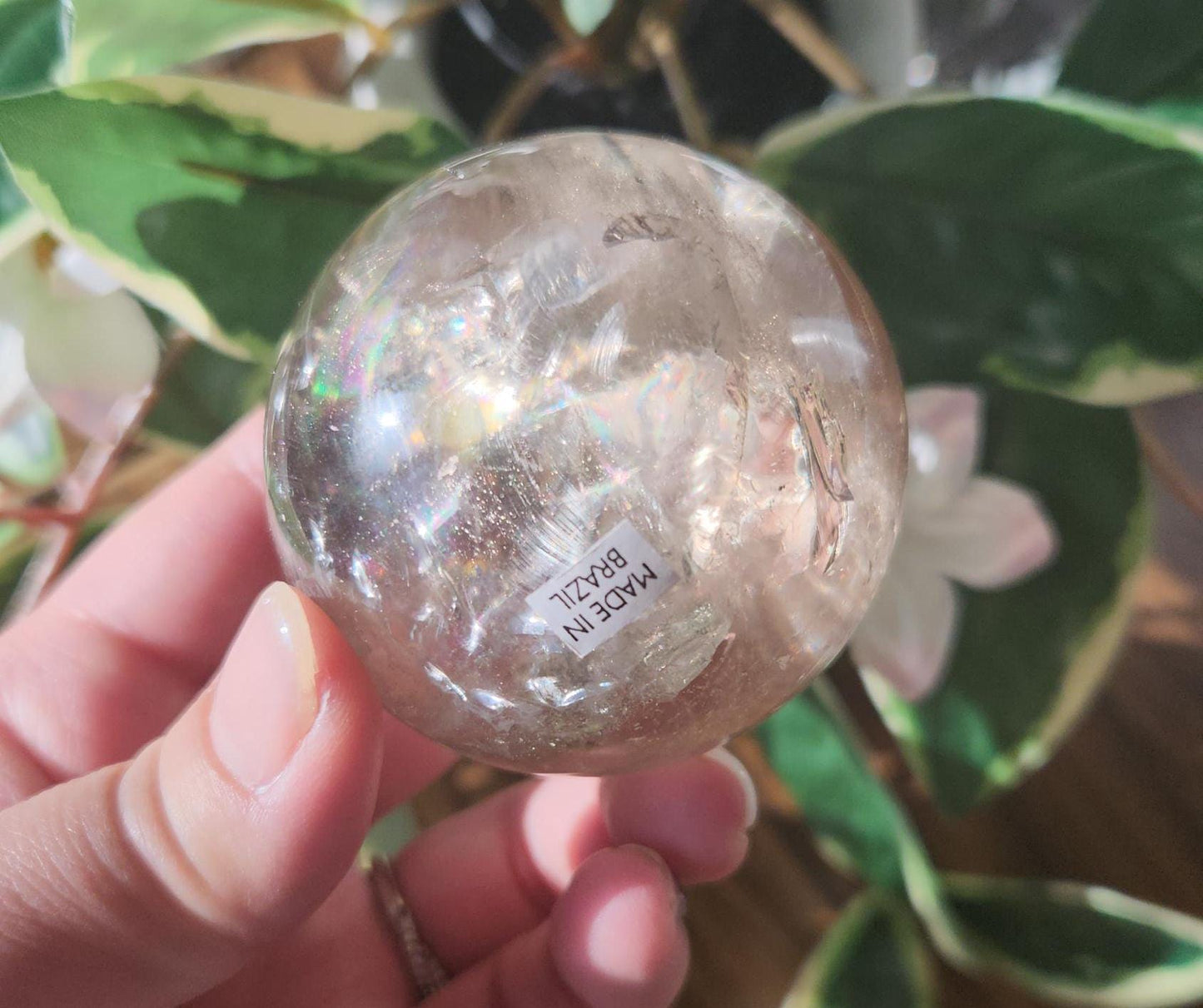 Amazing natural light smoky quartz sphere with beautiful rainbows and inclusions