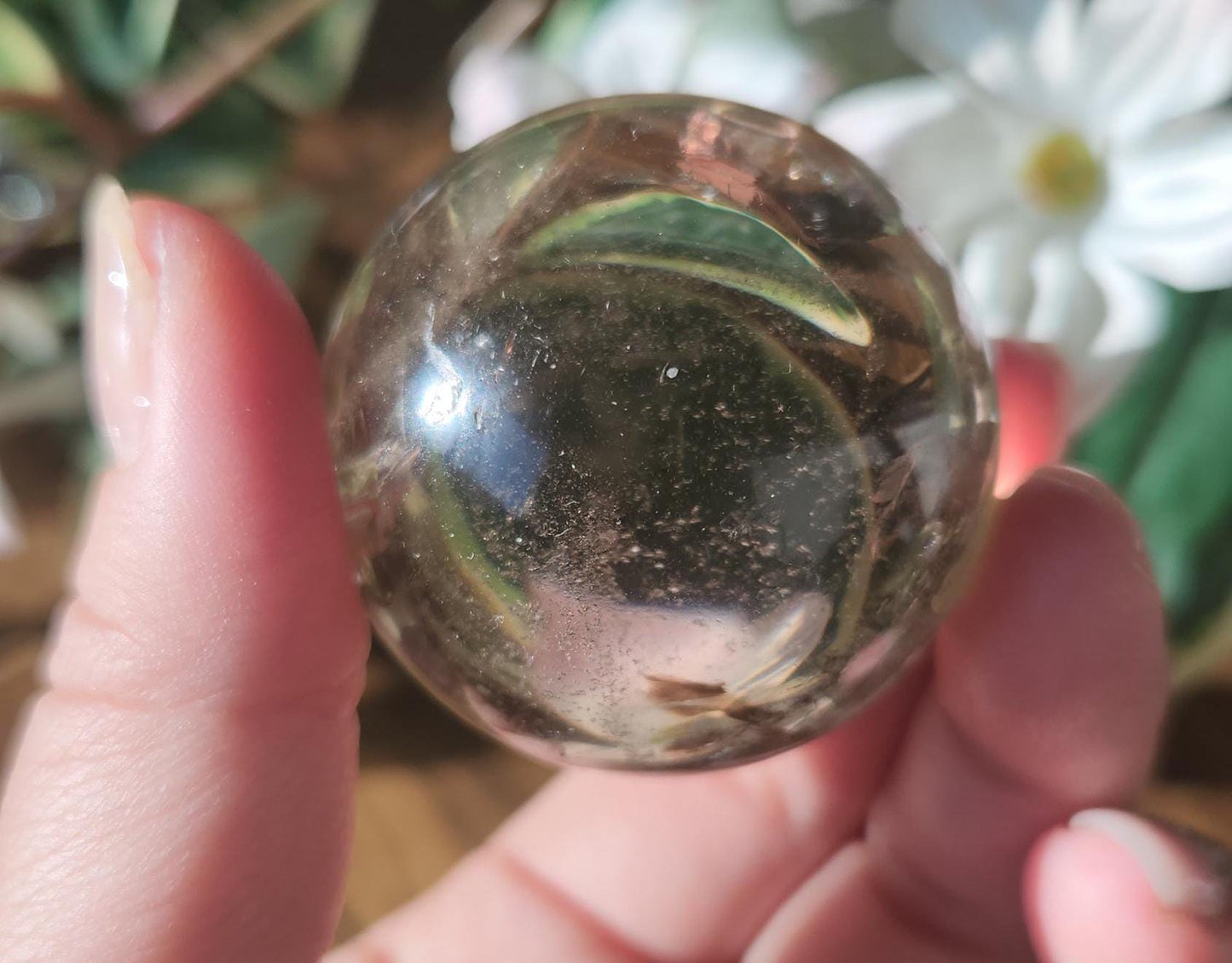 High quality natural smoky quartz sphere with many rainbows and inclusions 34A
