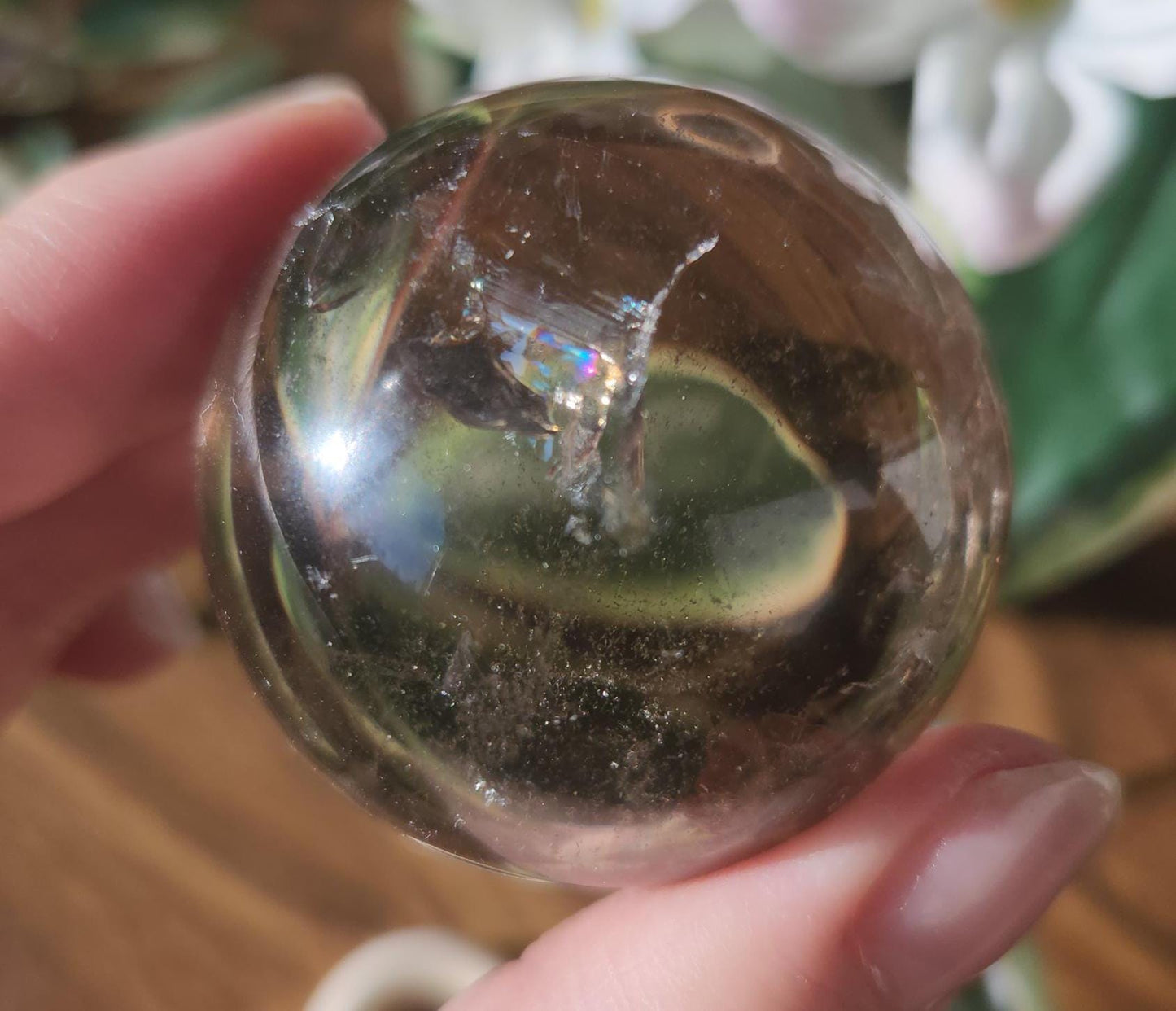 High quality natural smoky quartz sphere with many rainbows and inclusions 34A