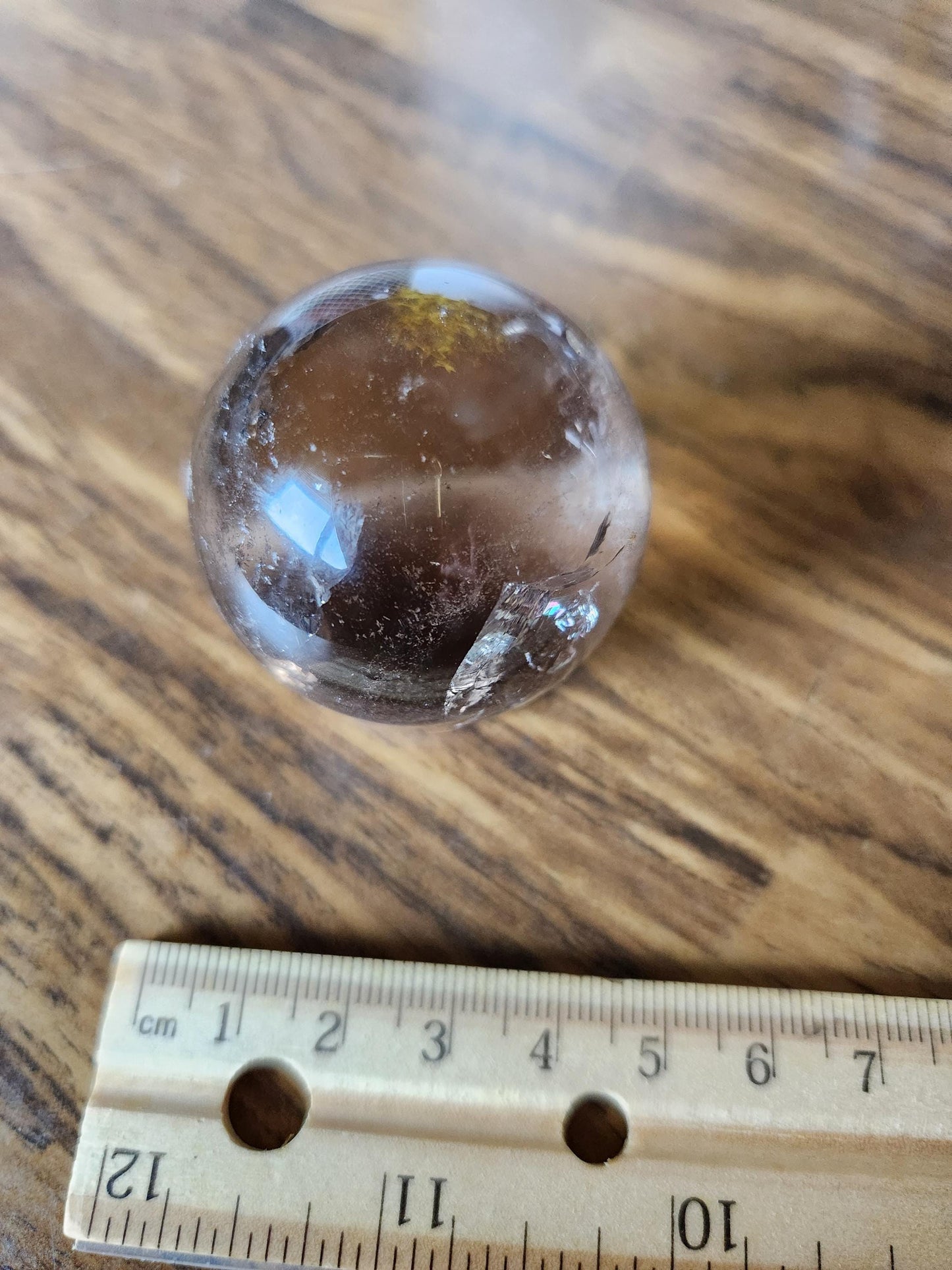 High quality natural smoky quartz sphere with many rainbows and inclusions 34A