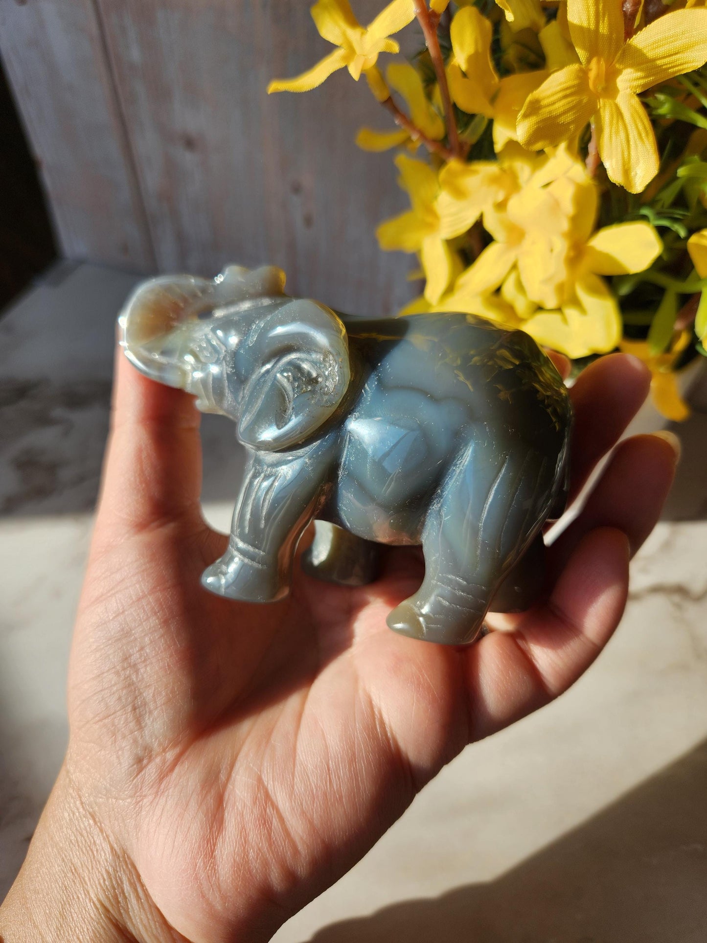 Beautiful hand carved elephant, dark blue gray agate with a sparkly quartz druzy pocket, natural, pretty banding