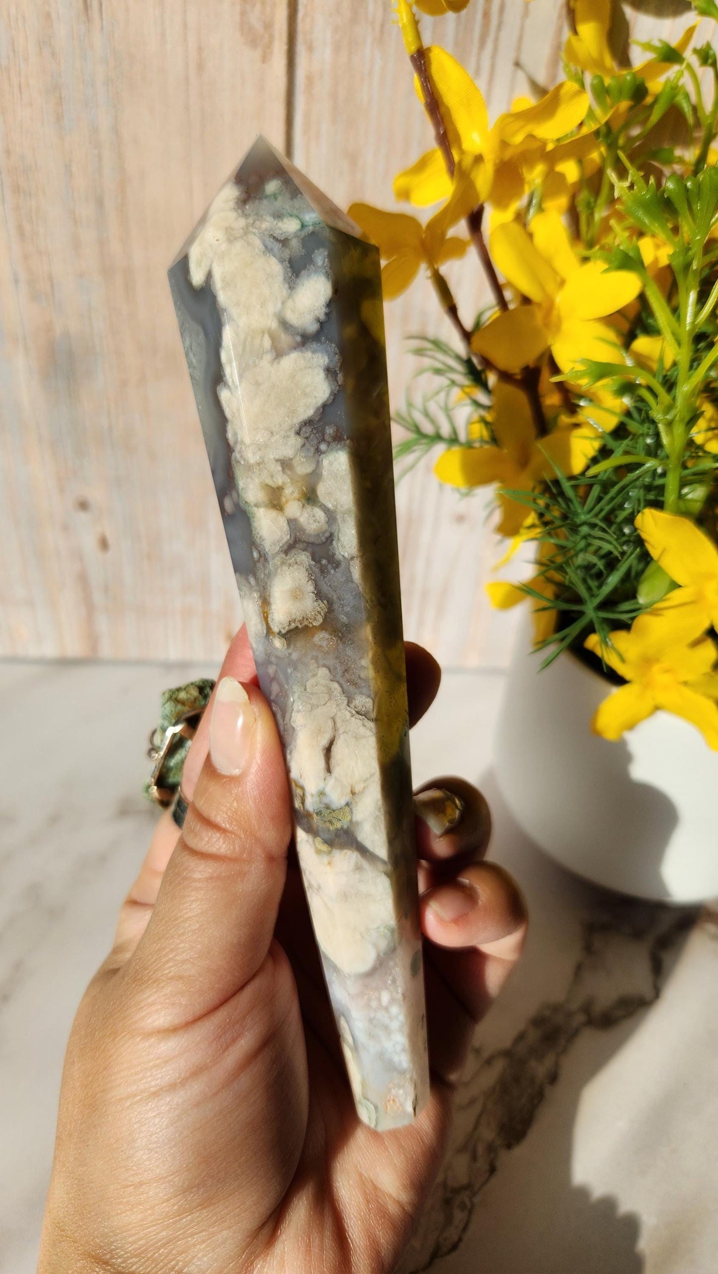 Natural black flower agate wand with stand, has quartz, black chalcedony, a touch of green, and beautiful agate banding from Madagascar
