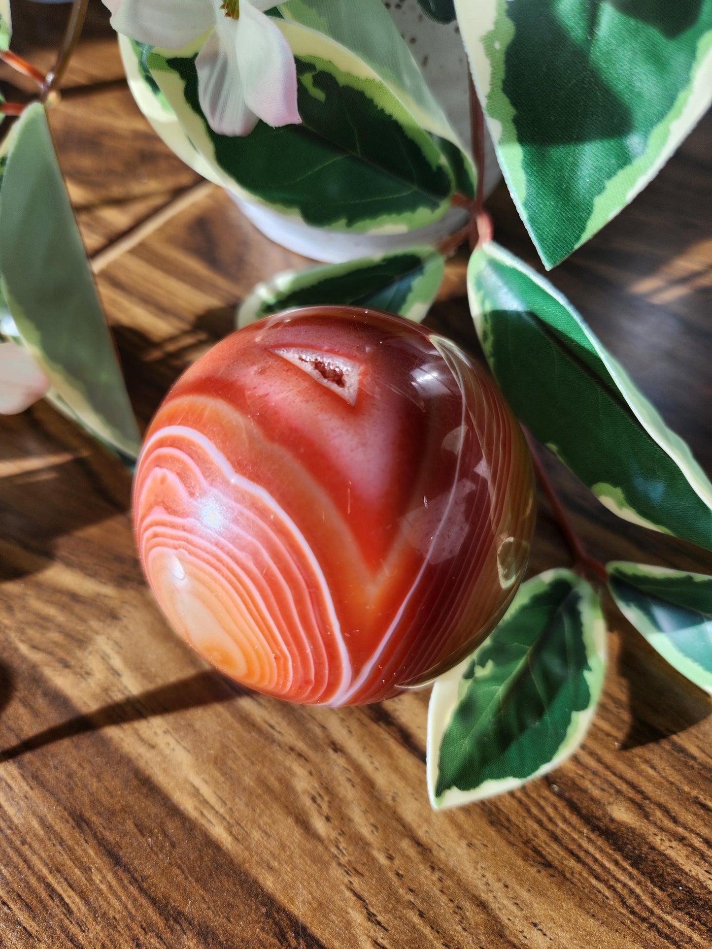 Amazing natural carnelian/sardonyx sphere with beautiful banding, has a druzy 67.2mm