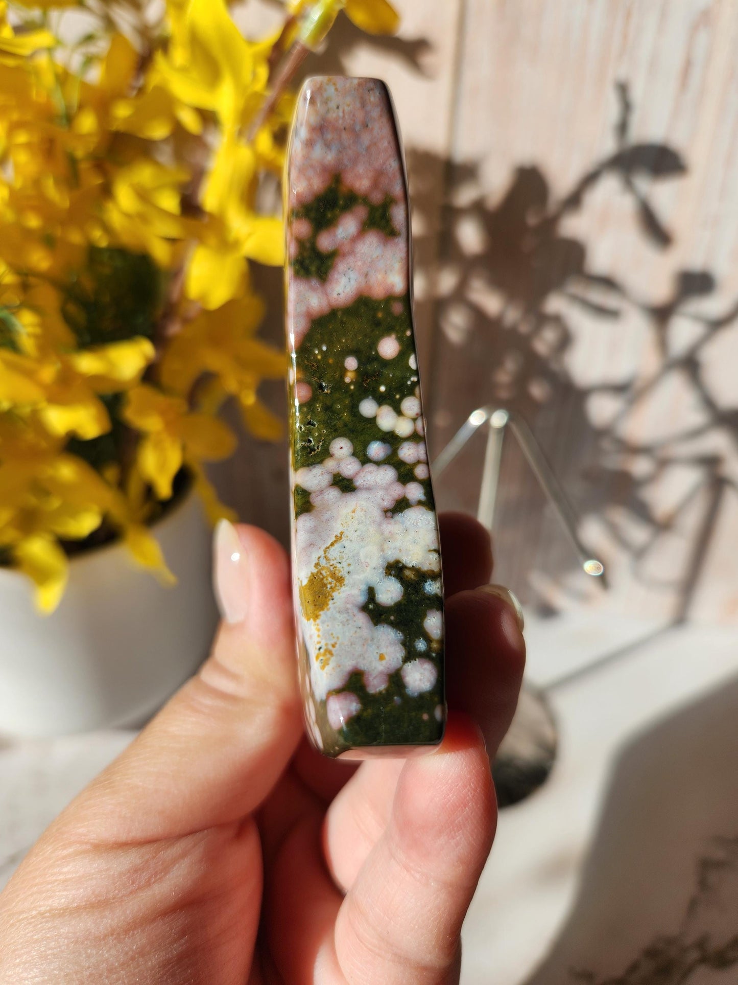 Pretty ocean jasper moon with beautiful colors, stand included