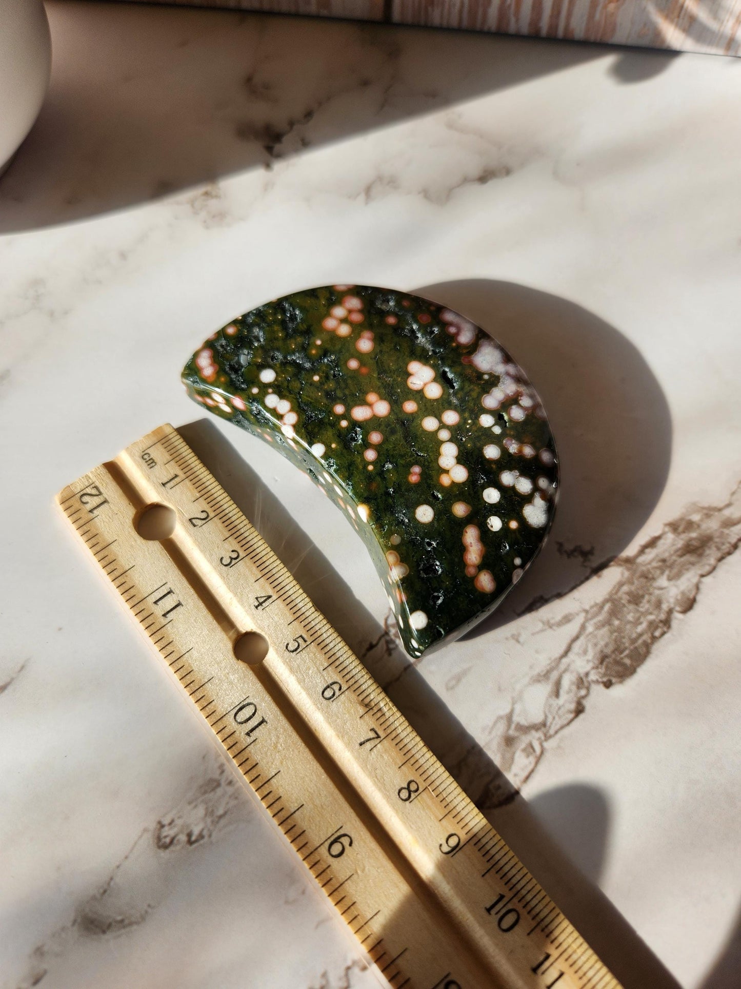 Pretty ocean Jasper moon with sparkly small druzy pockets