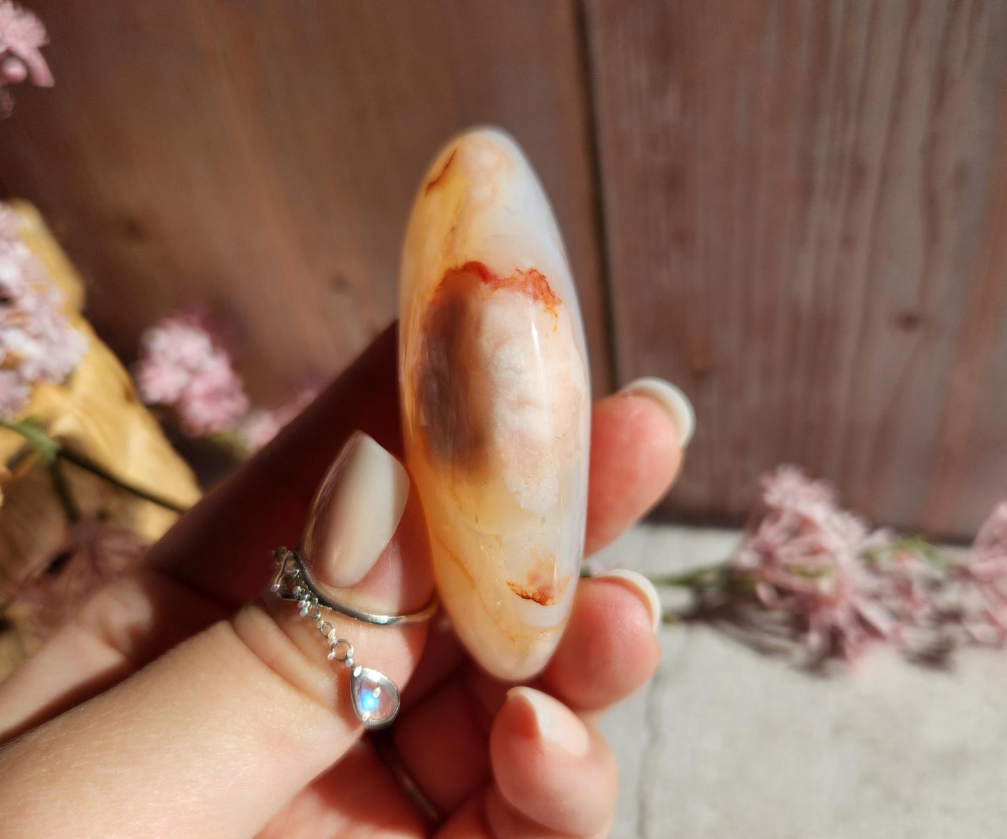 High quality natural carnelian flower agate palm stone with flowers, druzy and agate banding from Madagascar, cherry blossoms, translucent