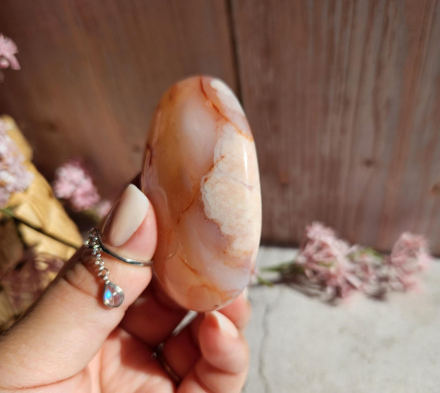 High quality natural carnelian flower agate palm stone with flowers, druzy and agate banding from Madagascar, cherry blossoms, translucent
