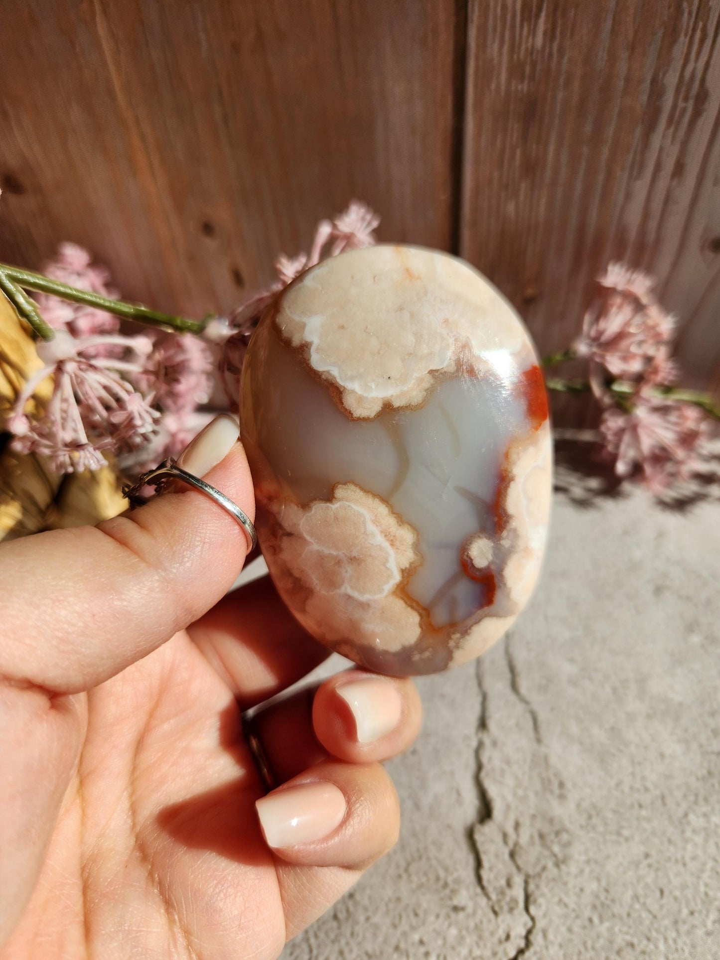 Beautiful natural carnelian flower agate palm stone with flowers, druzy and agate banding from Madagascar, cherry blossoms