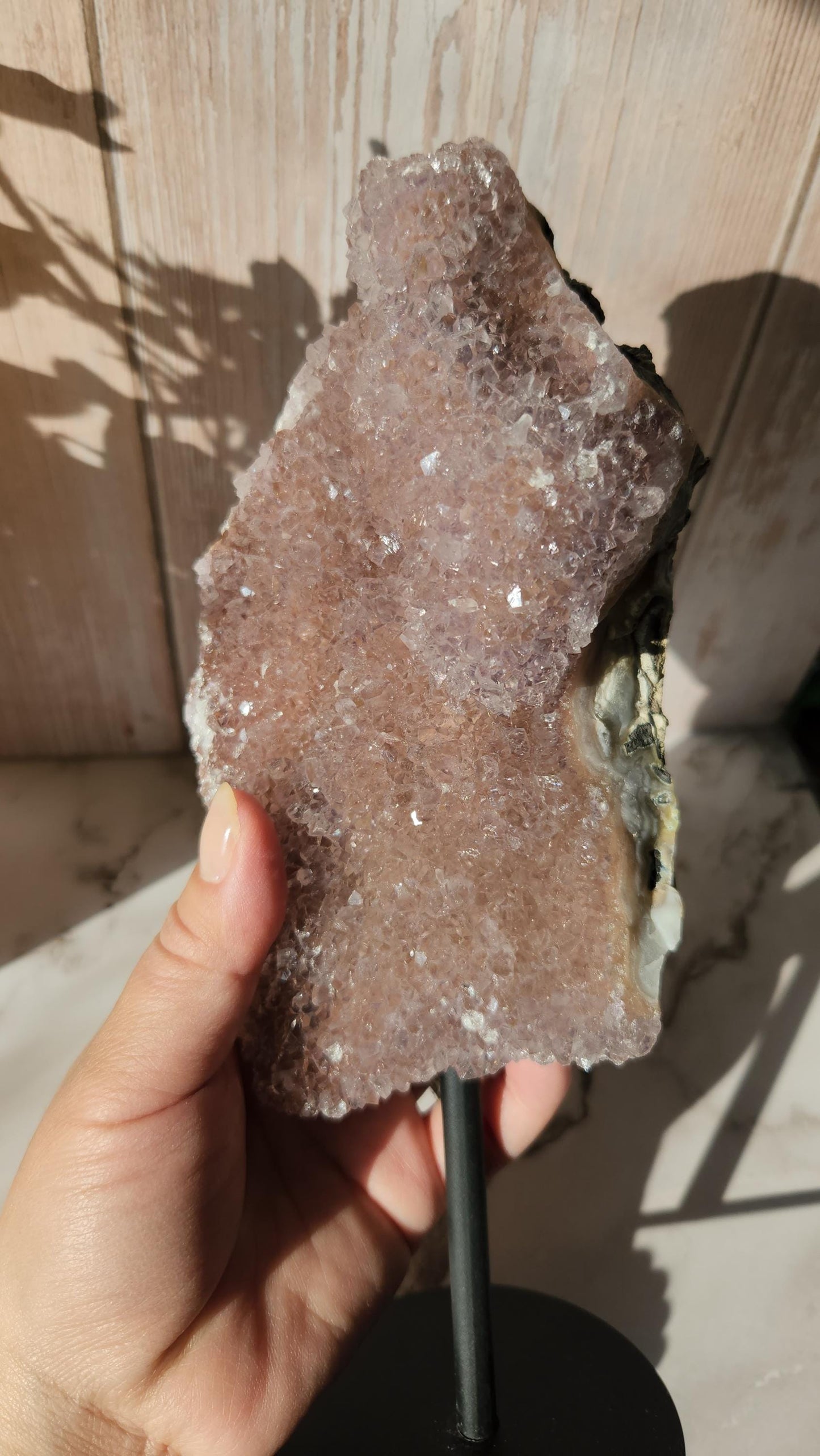 Large dusty pink rainbow amethyst on stand, natural unpolished rainbow amethyst with lustrous and sparkly points