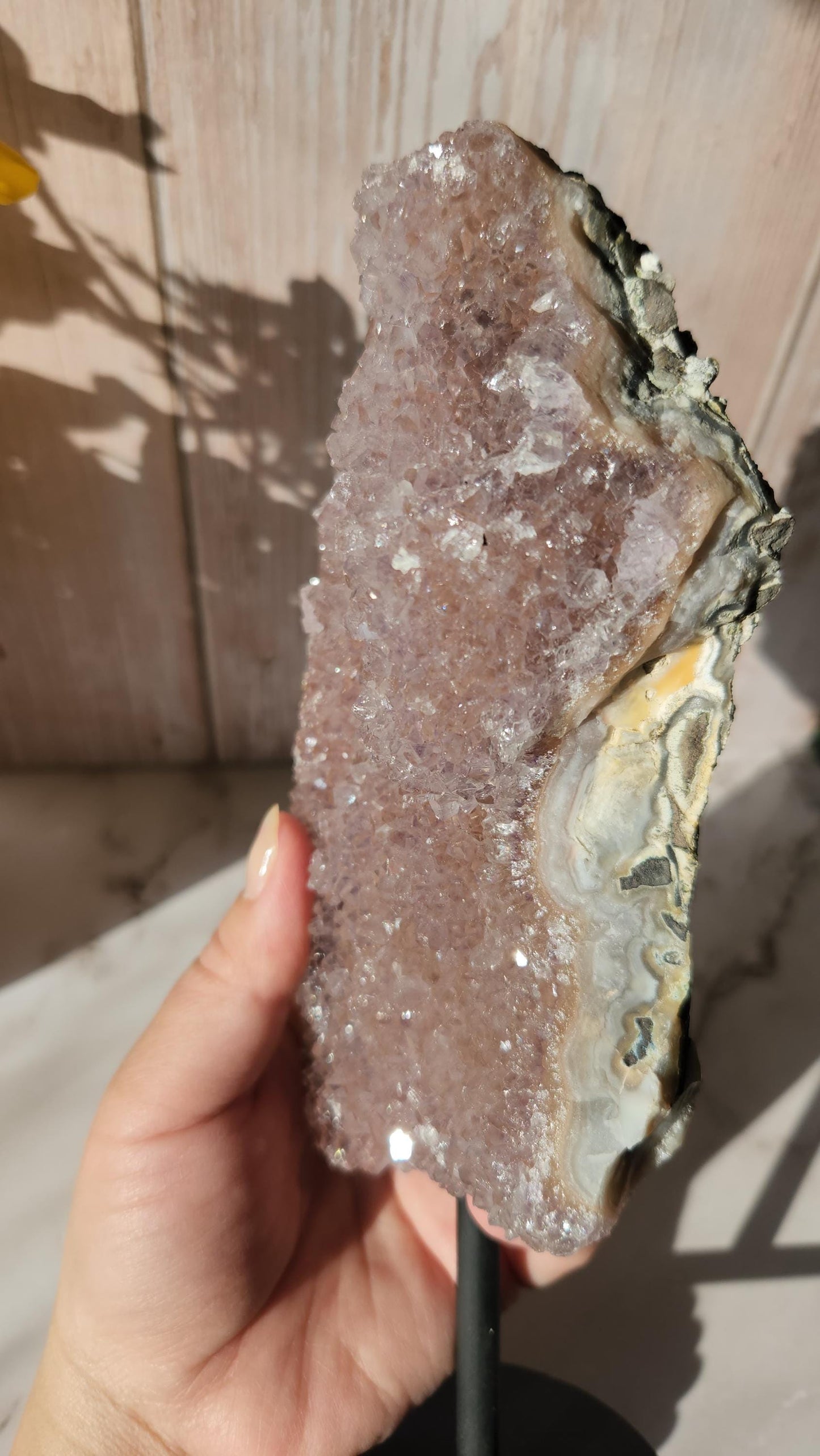 Large dusty pink rainbow amethyst on stand, natural unpolished rainbow amethyst with lustrous and sparkly points